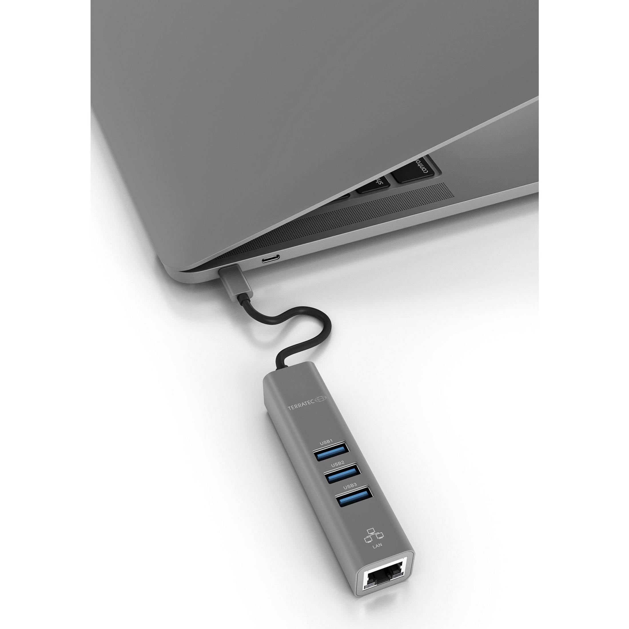 Laptop mit angeschlossenem grauem USB-Hub, USB- und LAN-Anschlüsse.