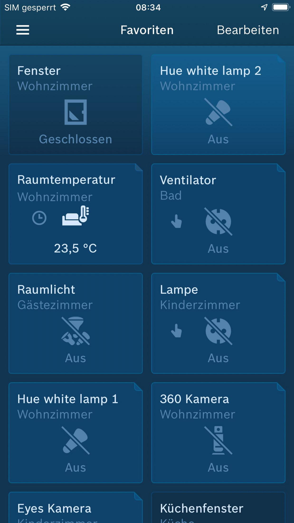Handy-Bildschirm mit App-Icons in einem Raster, mit Menüleiste und Zeitanzeige.