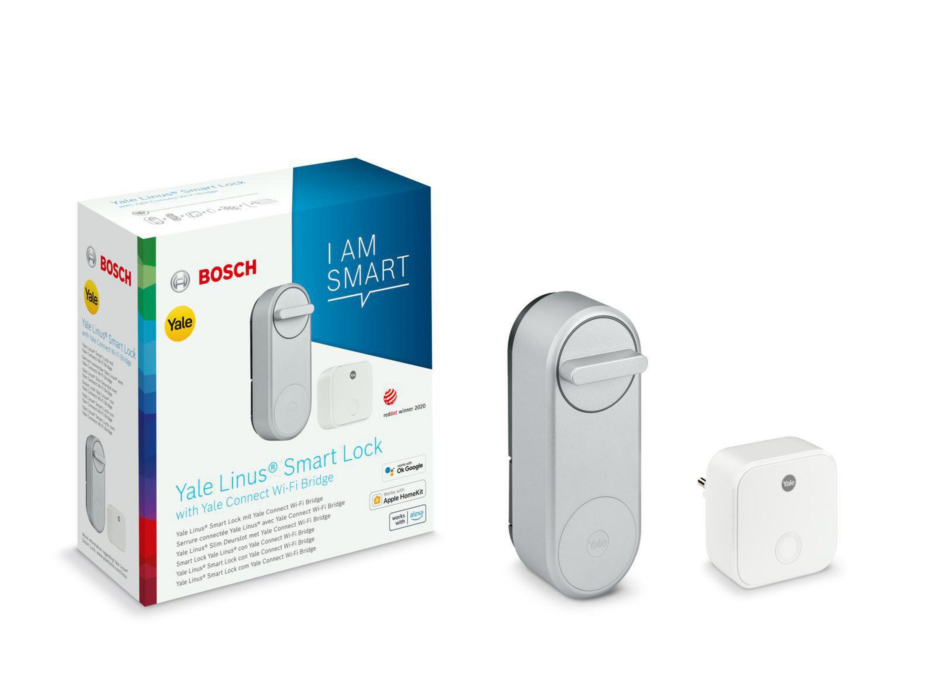 Eine Schachtel mit einem Smart Lock und einem kleinen weißen Gerät.