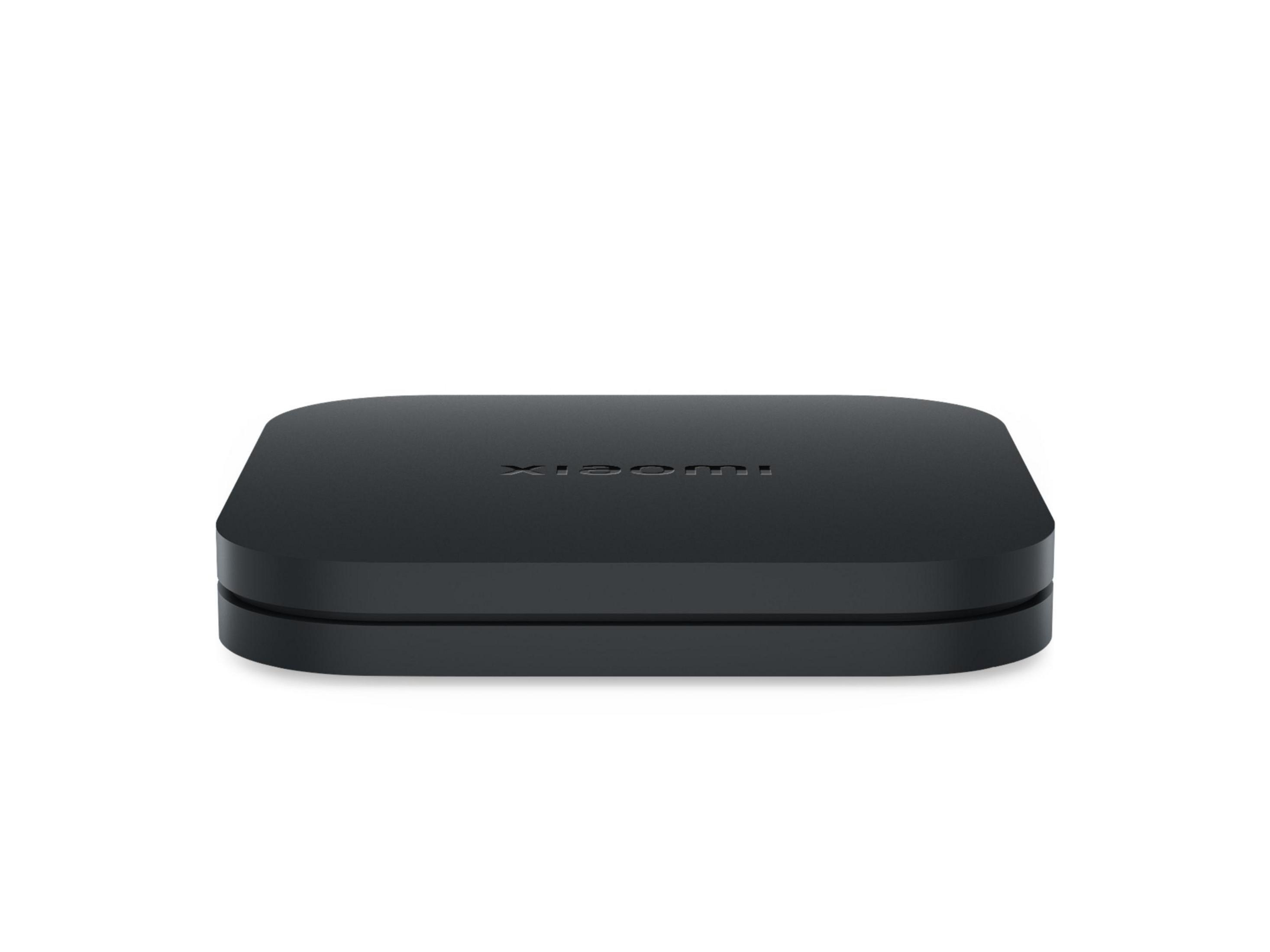Ein schwarzer Xiaomi Streaming Media Player auf weißem Hintergrund, Draufsicht.