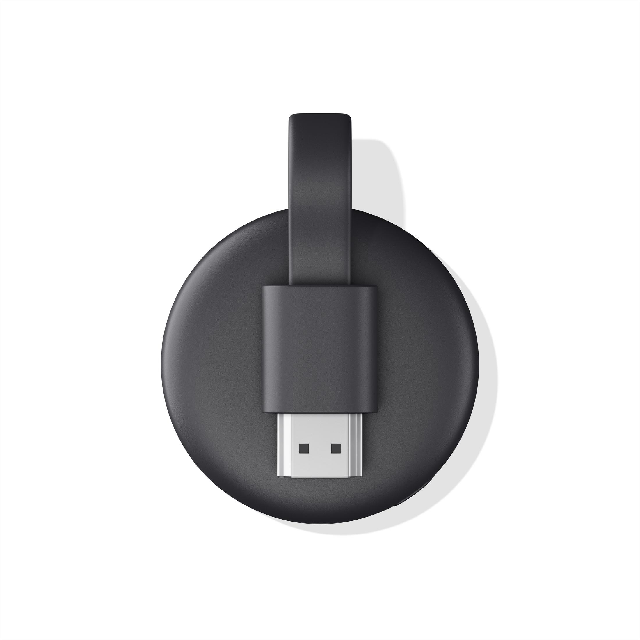 Ein schwarzes, rundes Chromecast-Gerät mit USB-C-Kabel, Draufsicht, vor weißem Hintergrund.