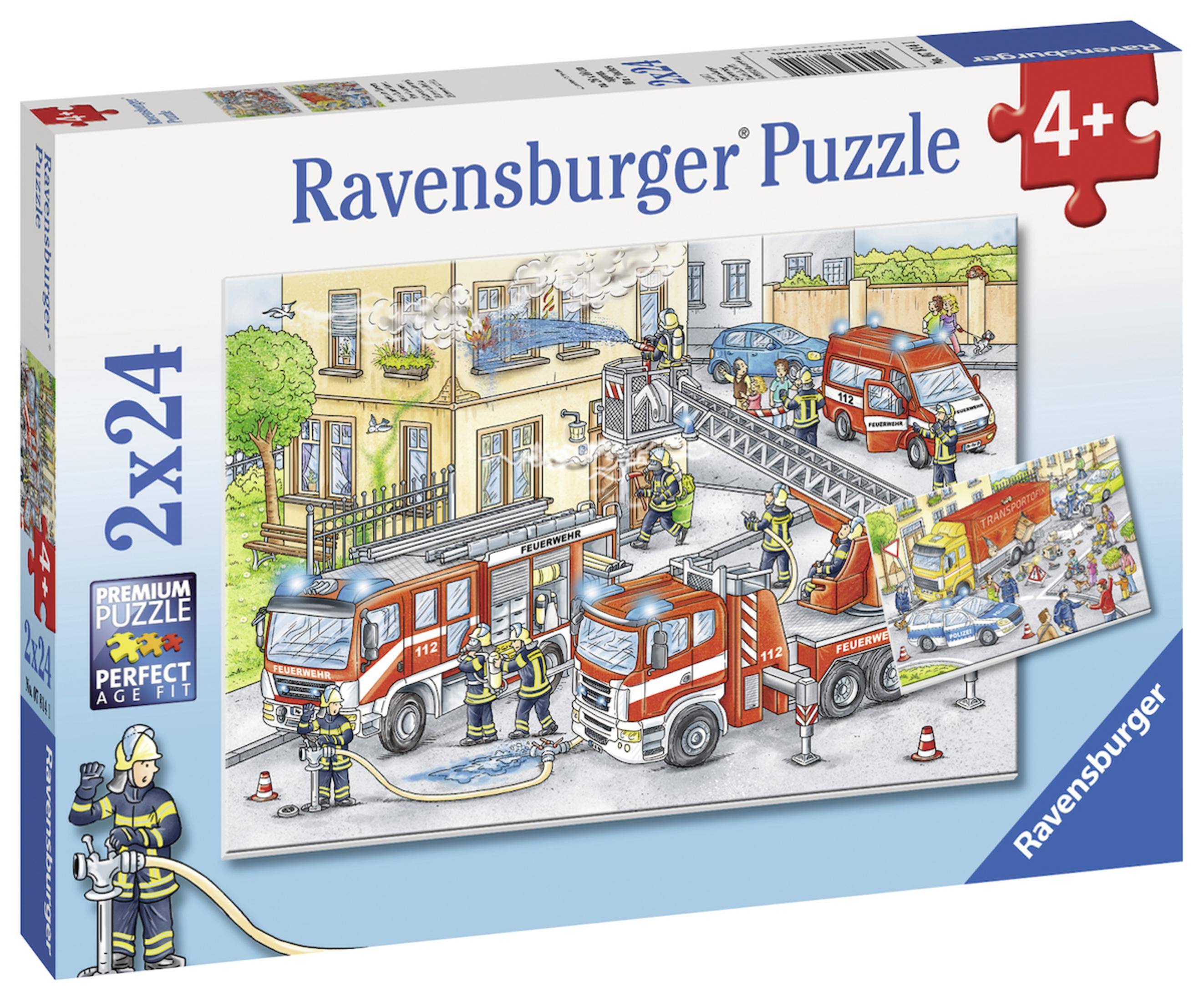 Puzzledose mit Feuerwehrleuten, Feuerwehrwagen und einem brennenden Gebäude. Die Box hat Text.