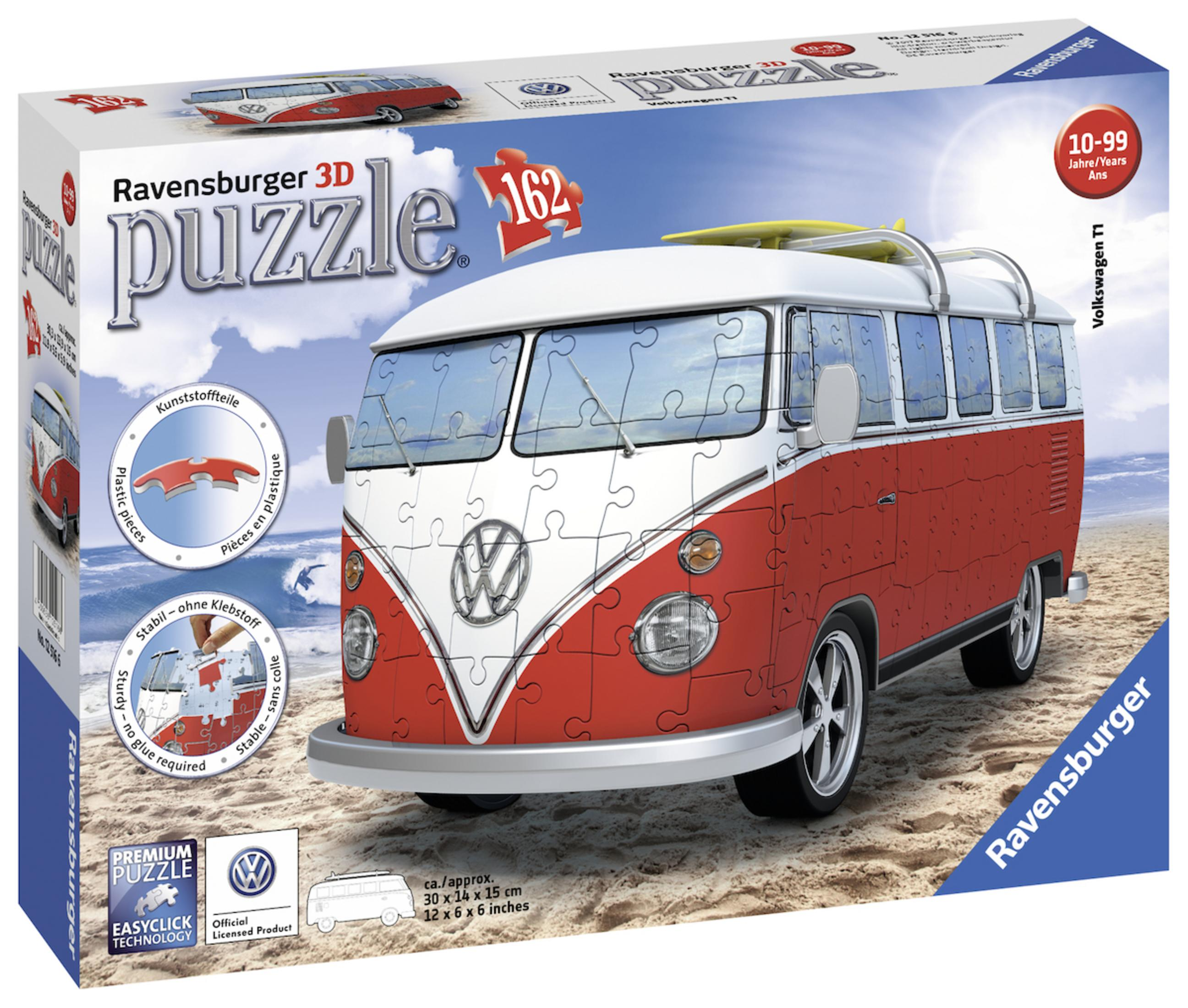 3D-Puzzle eines rot-weißen VW-Busses am Strand, mit Puzzleteilen und -box.