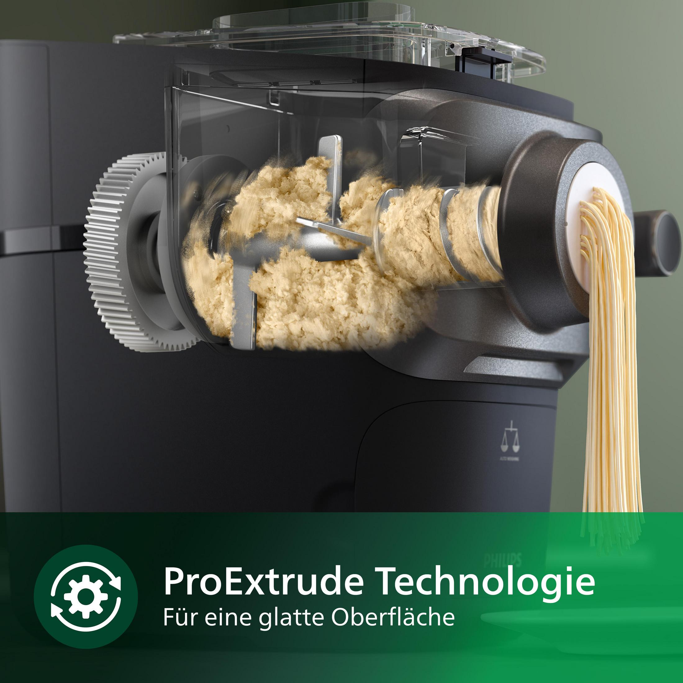 Maszyna do makaronu w akcji, wyciskająca makaron. Maszyna jest ciemnoszara z tekstem ProExtrude Technology.