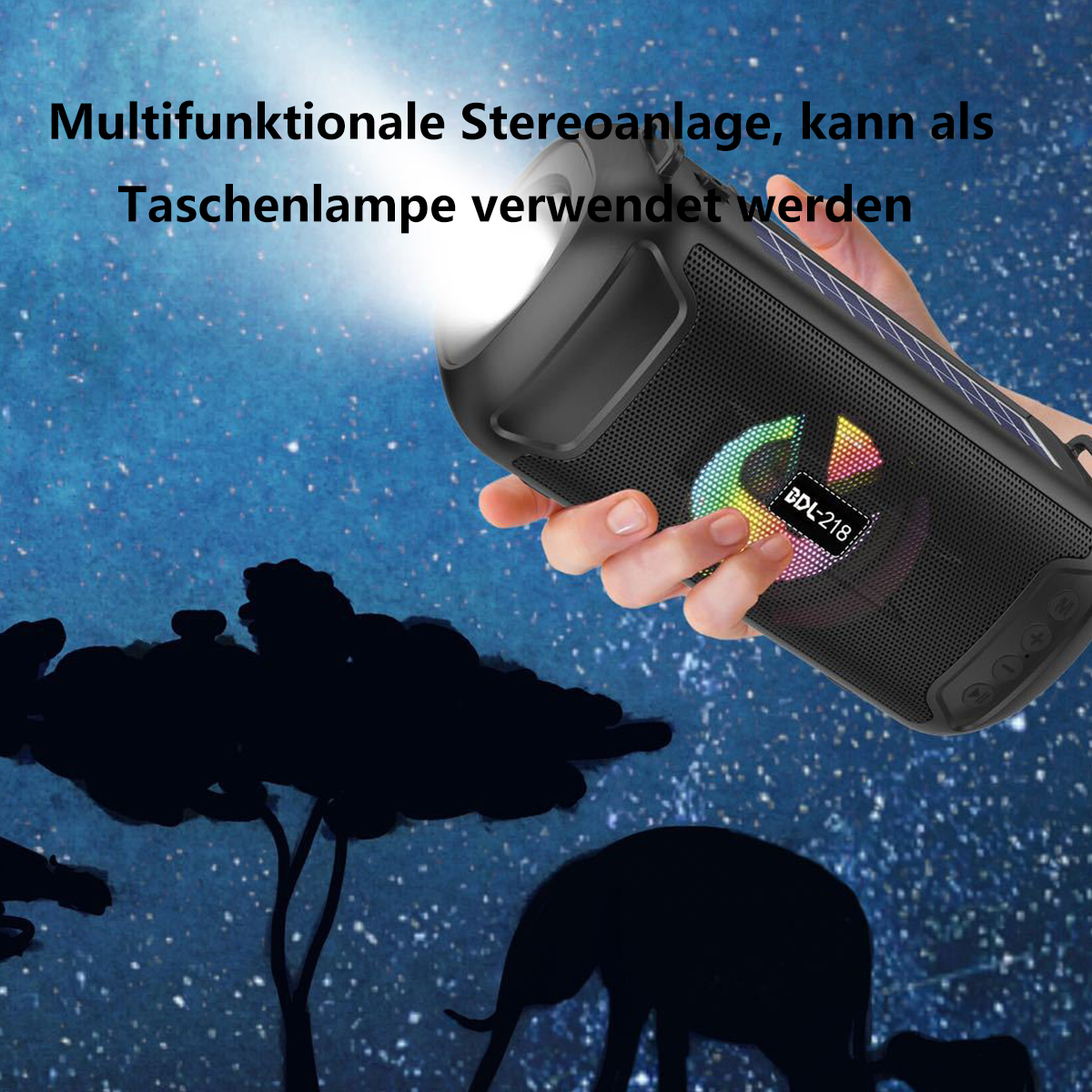 Hand hält schwarzen Lautsprecher mit Licht, mit Nachtszene im Hintergrund.
