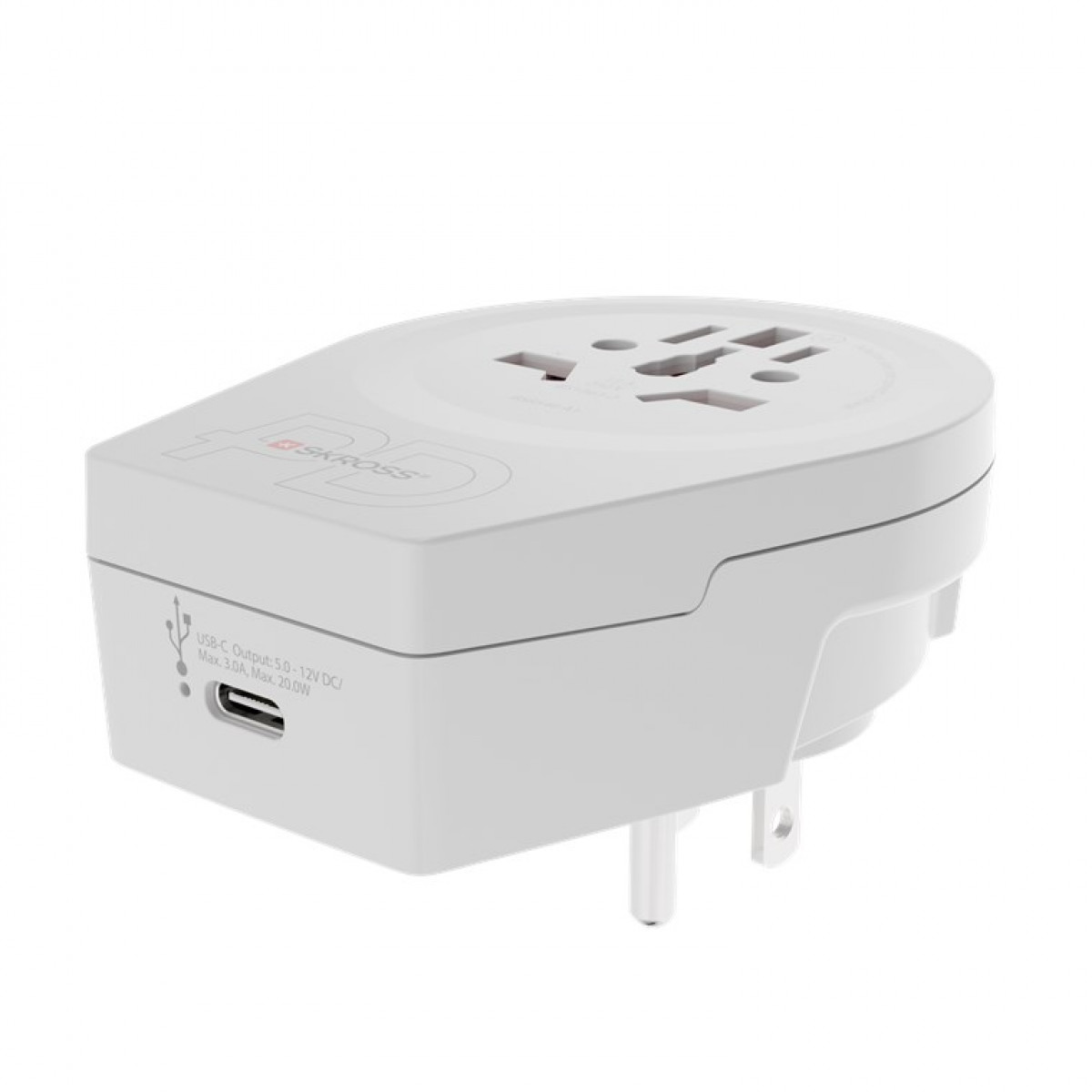 Adaptador de viaje blanco con múltiples tipos de enchufe y puerto USB-C. Marca Skross visible.