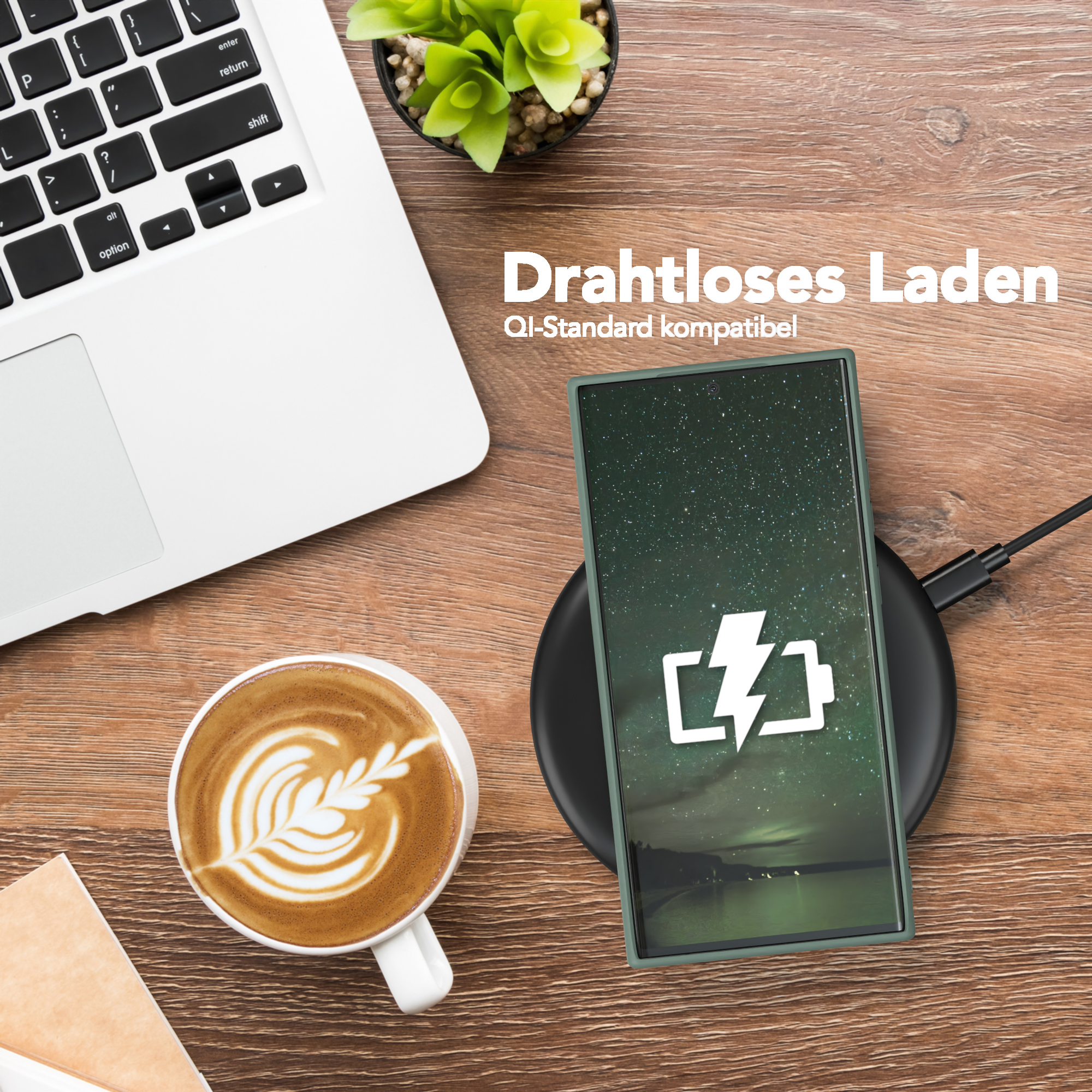Ein Telefon, das auf einem kabellosen Ladegerät geladen wird, Kaffee und Laptop. Text: Kabelloses Laden.