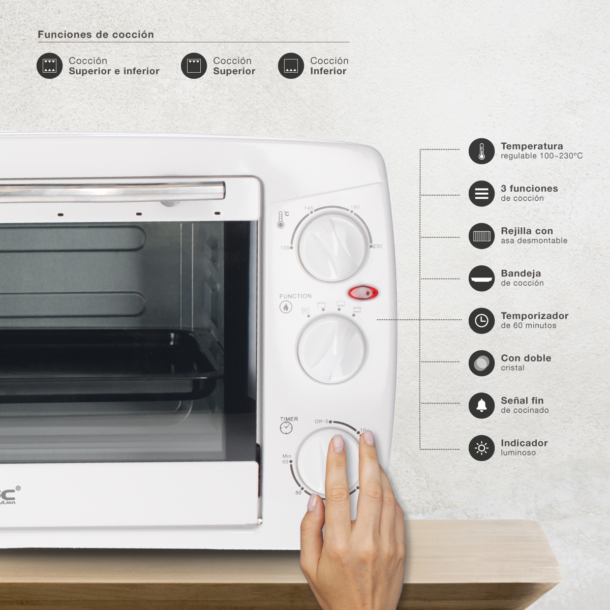 Un horno blanco con perillas de control e indicadores de función de cocción. El horno está sobre una superficie de madera.