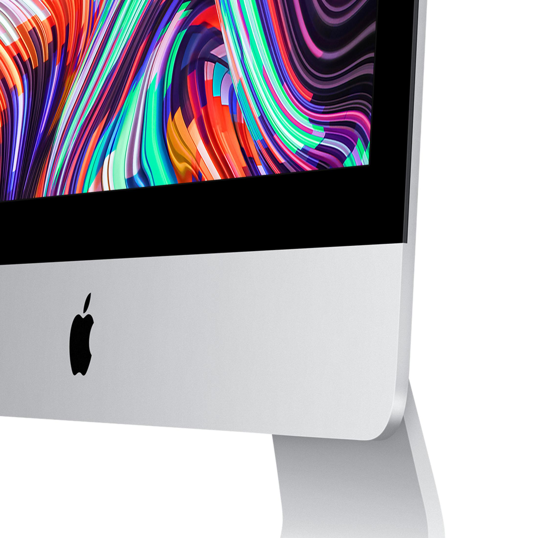 Zbliżenie srebrnego Apple iMac. Ekran pokazuje kolorową sztukę abstrakcyjną.