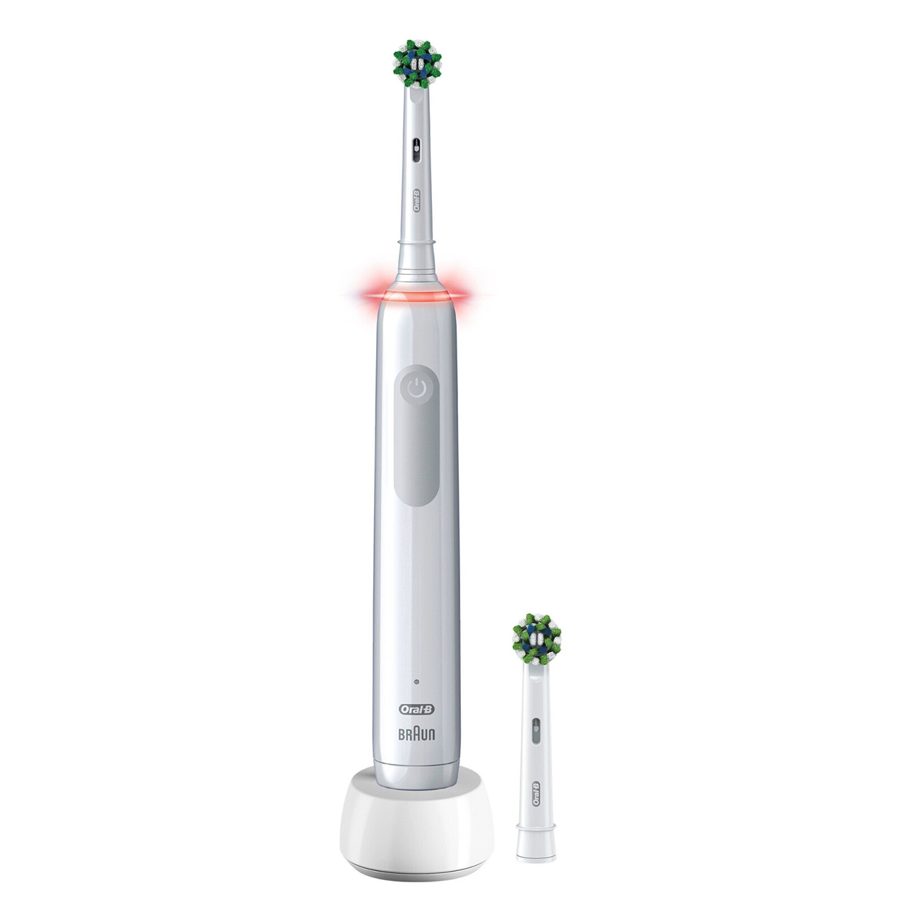 Biała elektryczna szczoteczka do zębów i główka szczoteczki. Szczoteczka jest na podstawie ładującej.