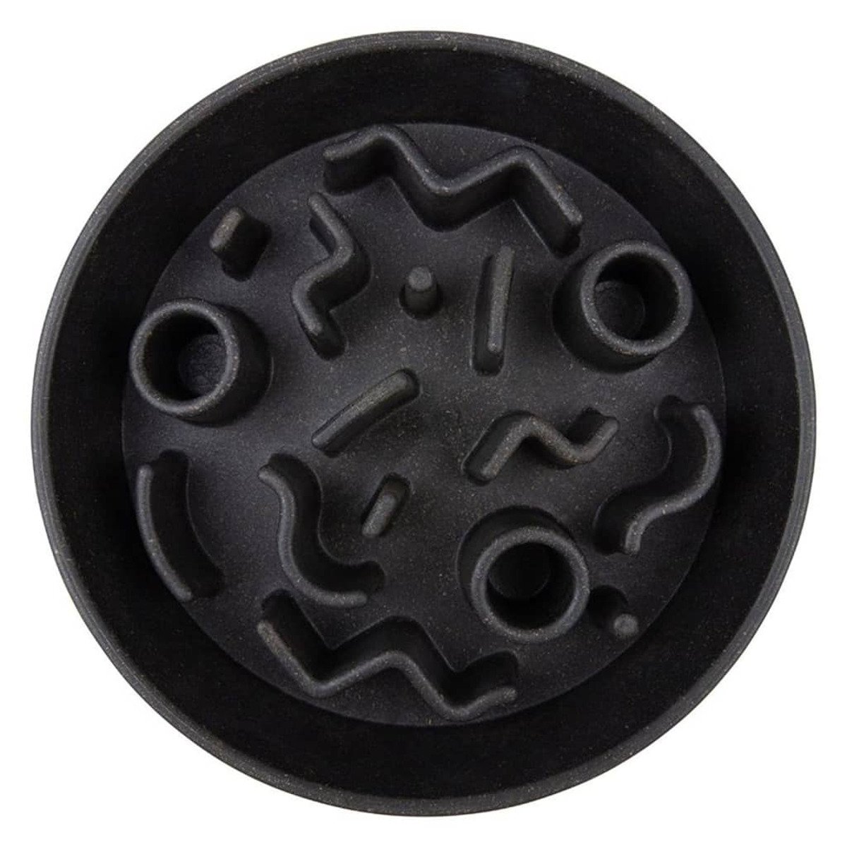 Gamelle noire pour chien avec motifs de labyrinthe en relief à l'intérieur, vue de dessus.