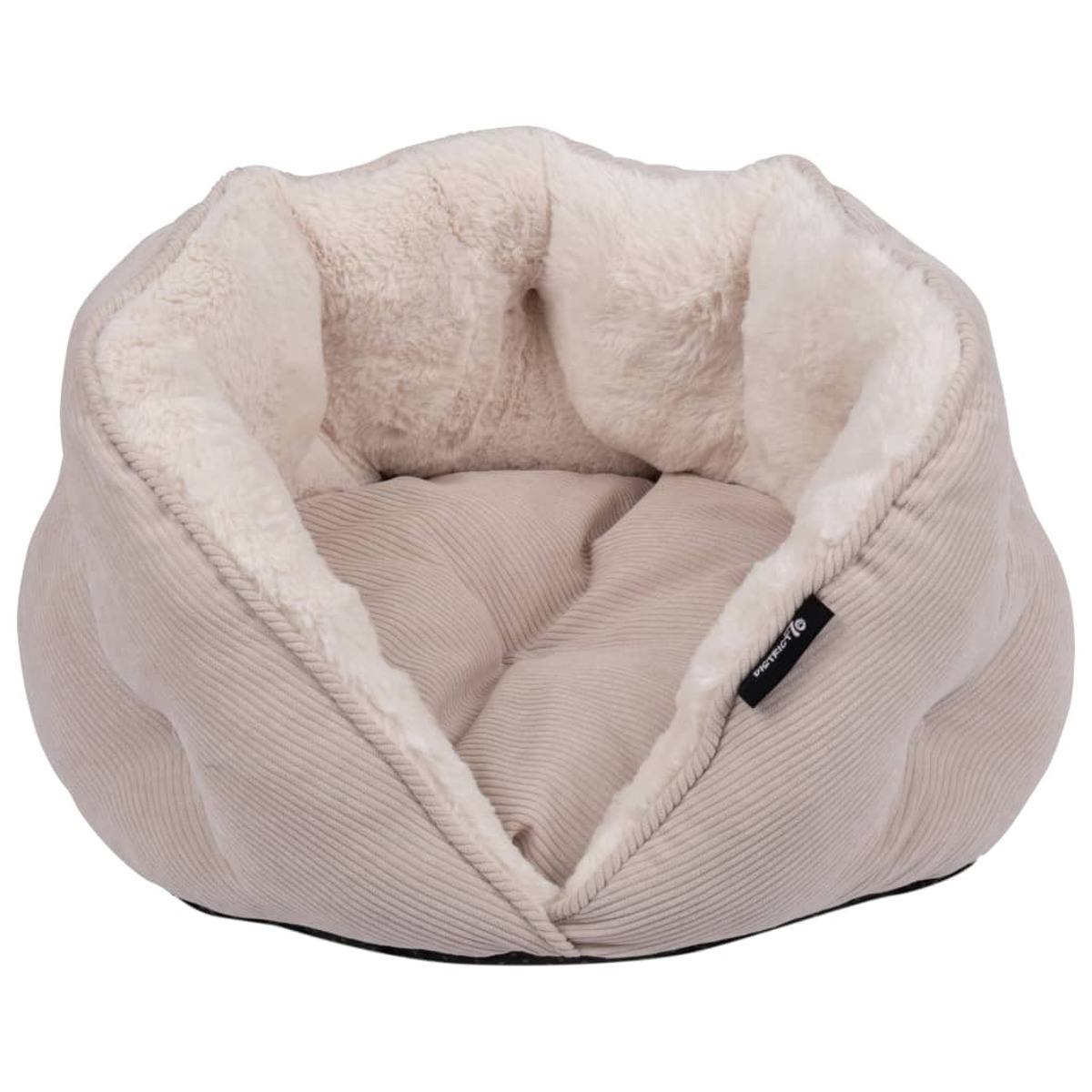 Cuccia beige per cani con interno bianco morbido. Esterno in velluto a coste, etichetta nera.