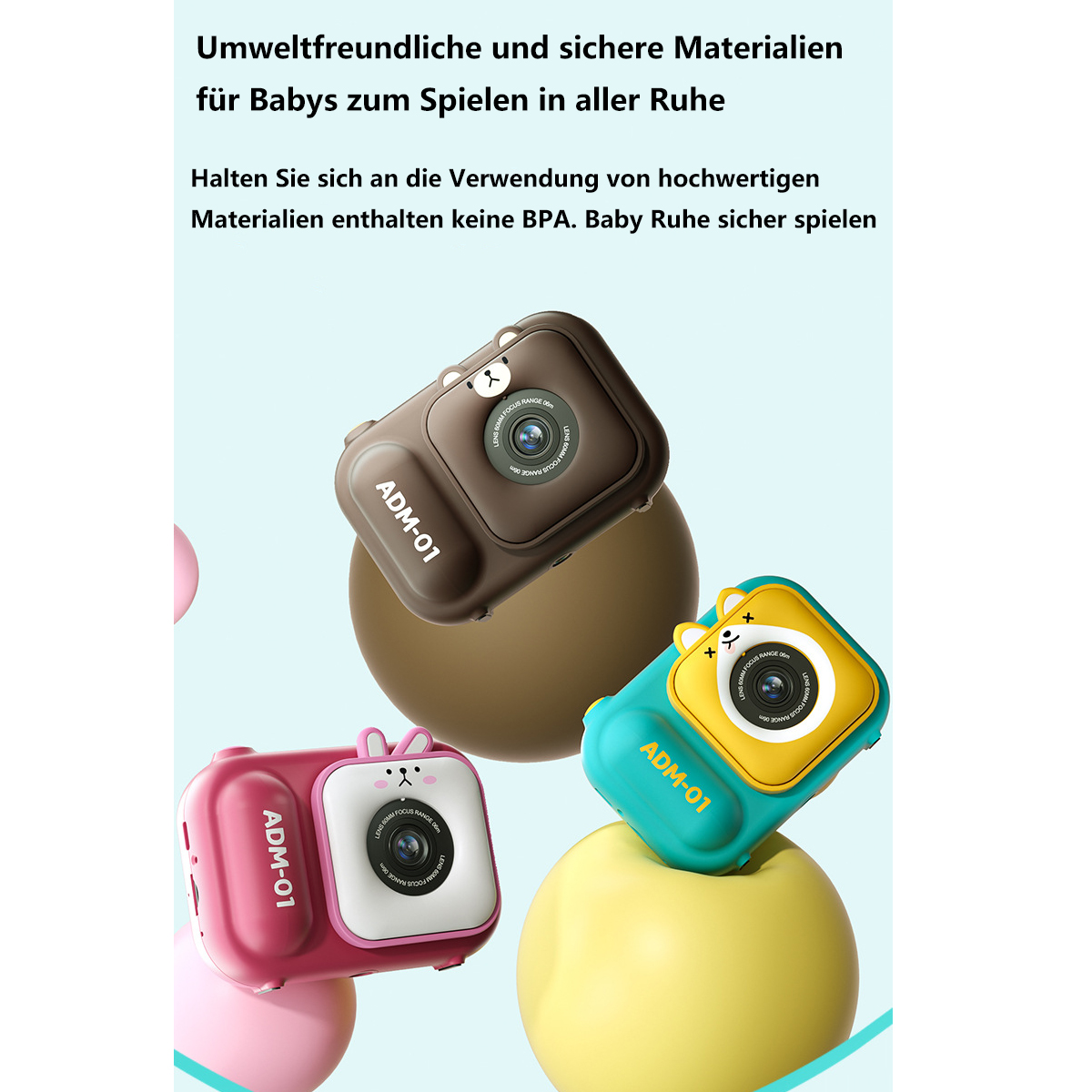 Drei Spielzeugkameras auf einer Oberfläche. Sie sind braun, rosa und gelb, unterschiedliche Größen.