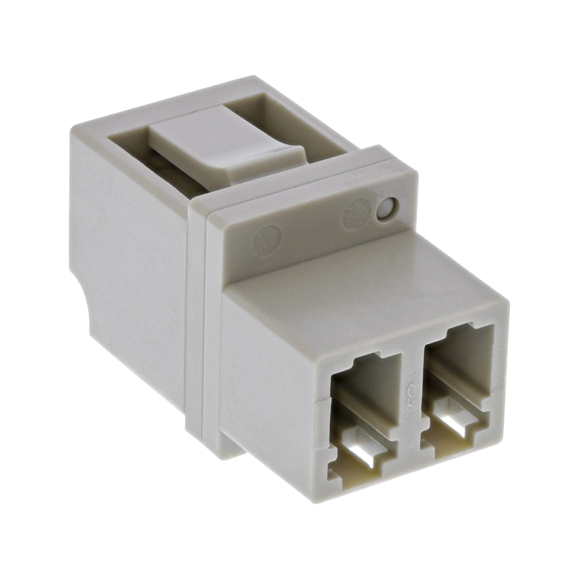 Ein kleiner, grauer RJ45-Koppler mit einem Stecker auf jeder Seite.
