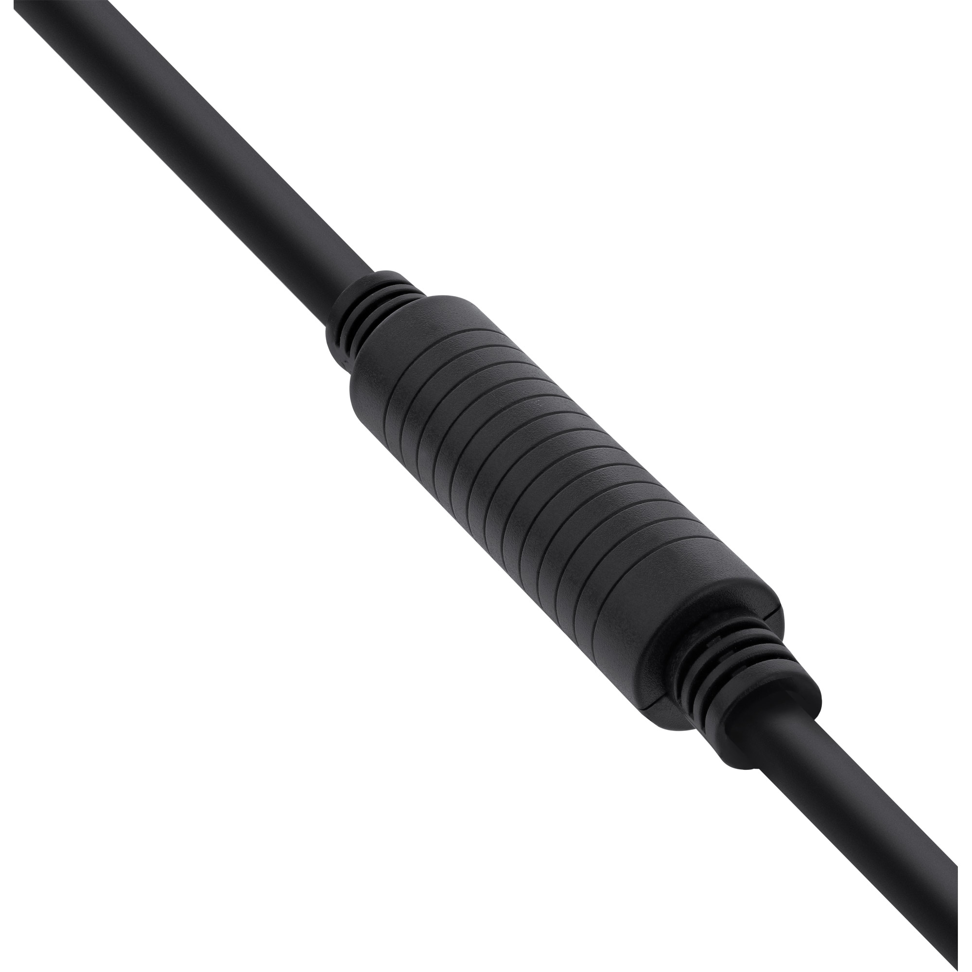 Câble noir avec un composant cylindrique noir et cannelé au milieu.