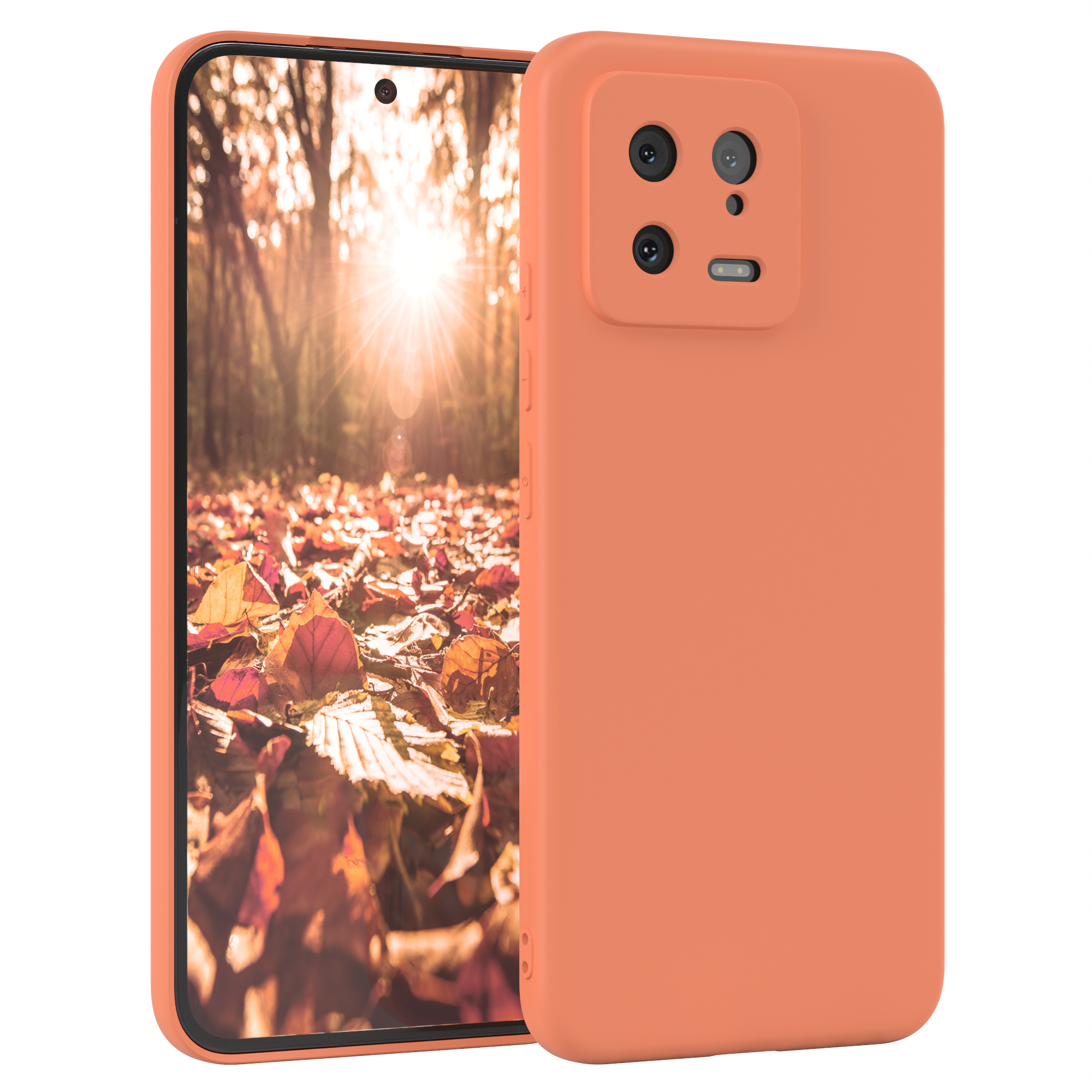 Zwei orangefarbene Telefone in Hüllen. Eines steht, das andere liegt flach. Herbstlandschaft.