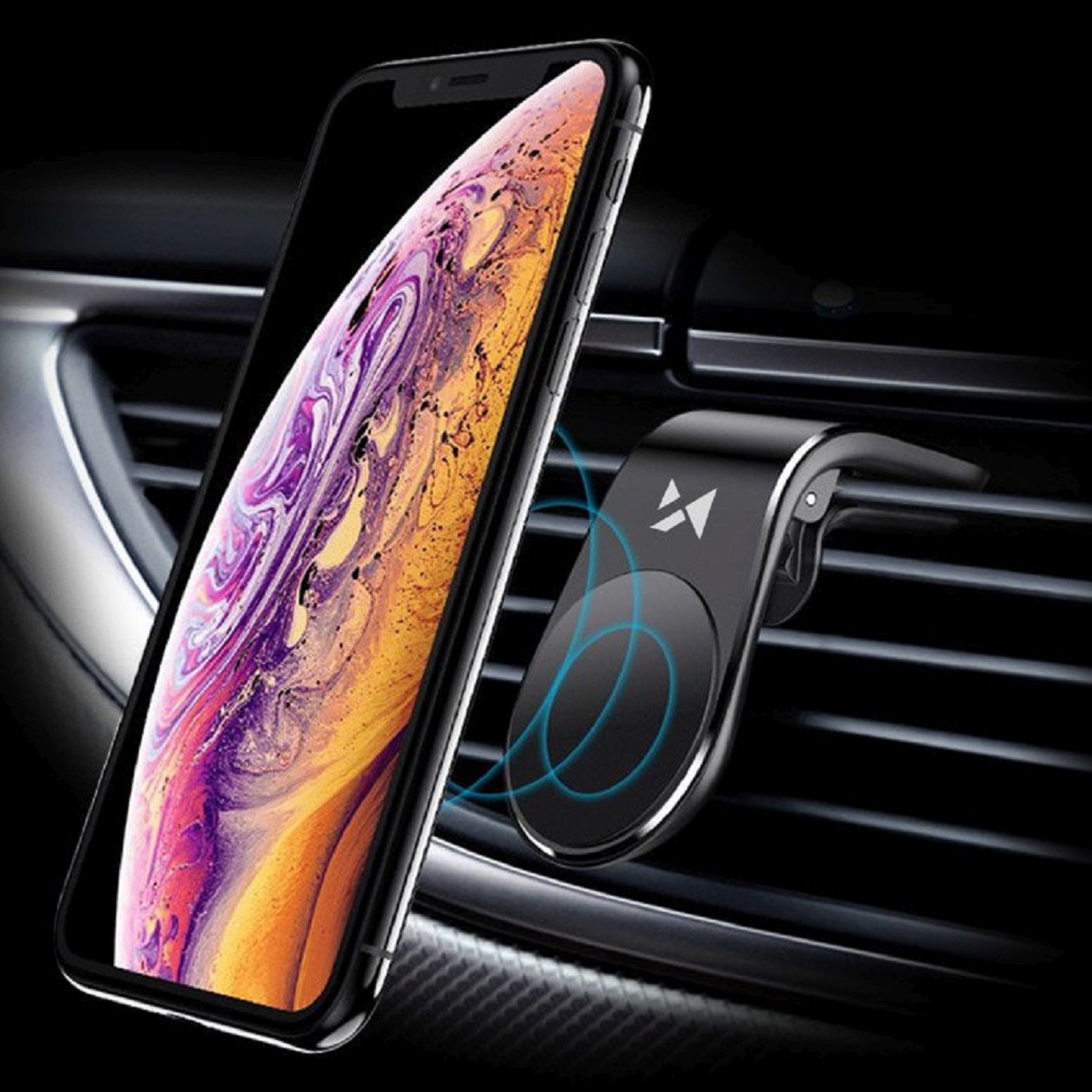 Smartfon zamontowany w kratce wentylacyjnej samochodu, pokazujący telefon i uchwyt magnetyczny.