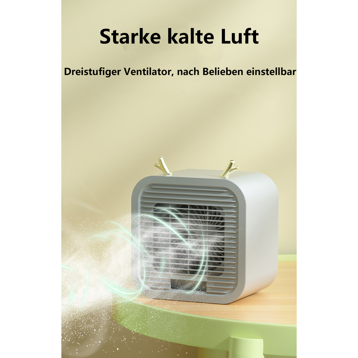 Weißer und grauer Luftkühler mit goldenen Hörnern auf einem Holztisch. Text auf Deutsch.