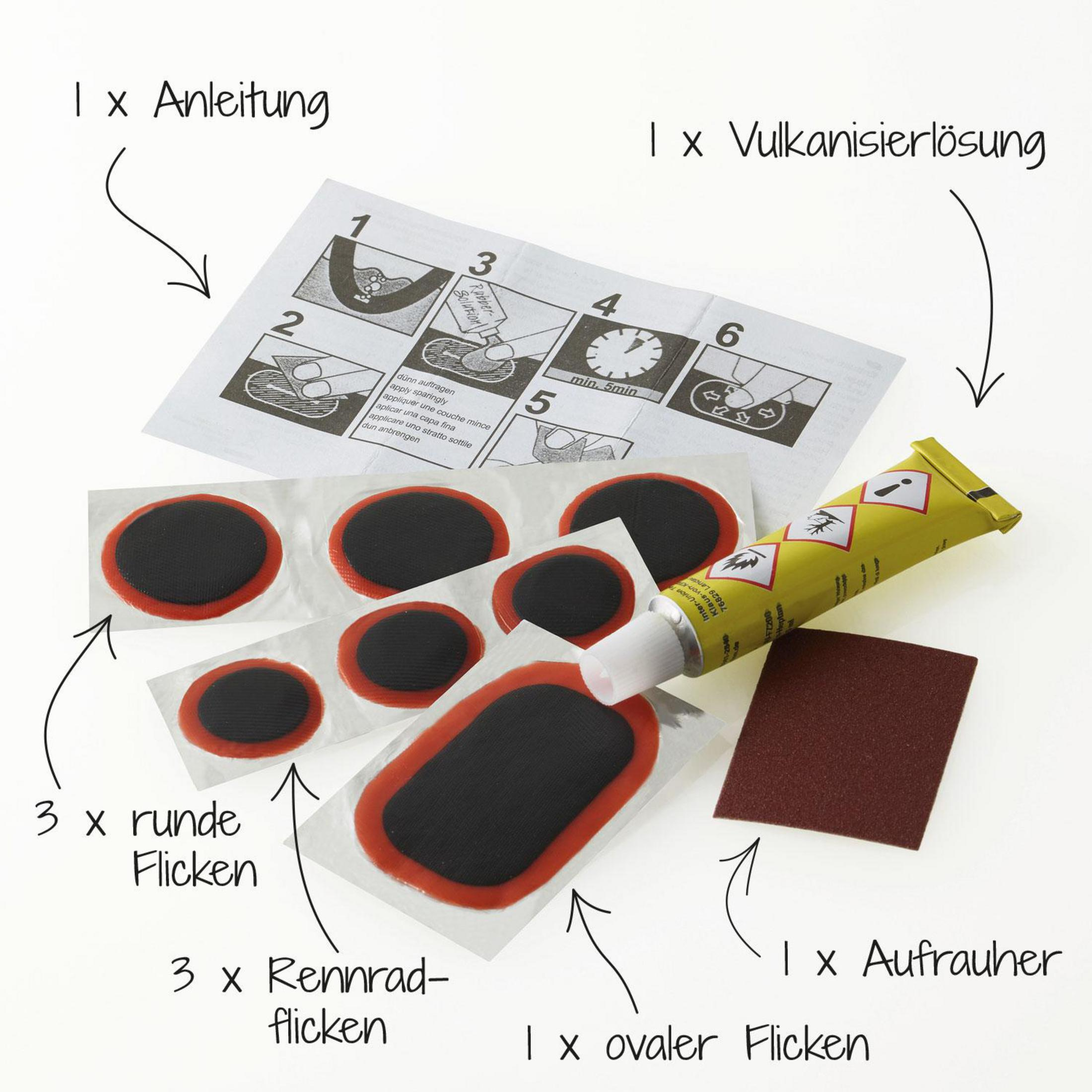 Ein Reifenreparatur-Set mit Flicken, Kleber, Schleifpapier und Anweisungen auf weißer Oberfläche.