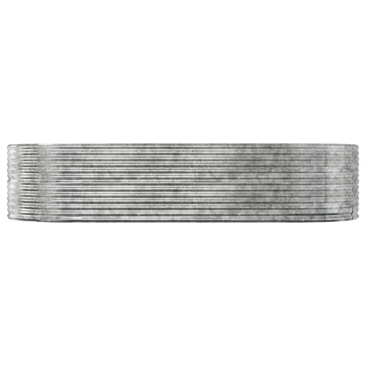 Eine lange, dünne Metallplatte mit horizontalen Rippen, wahrscheinlich Teil eines Wärmetauschers.