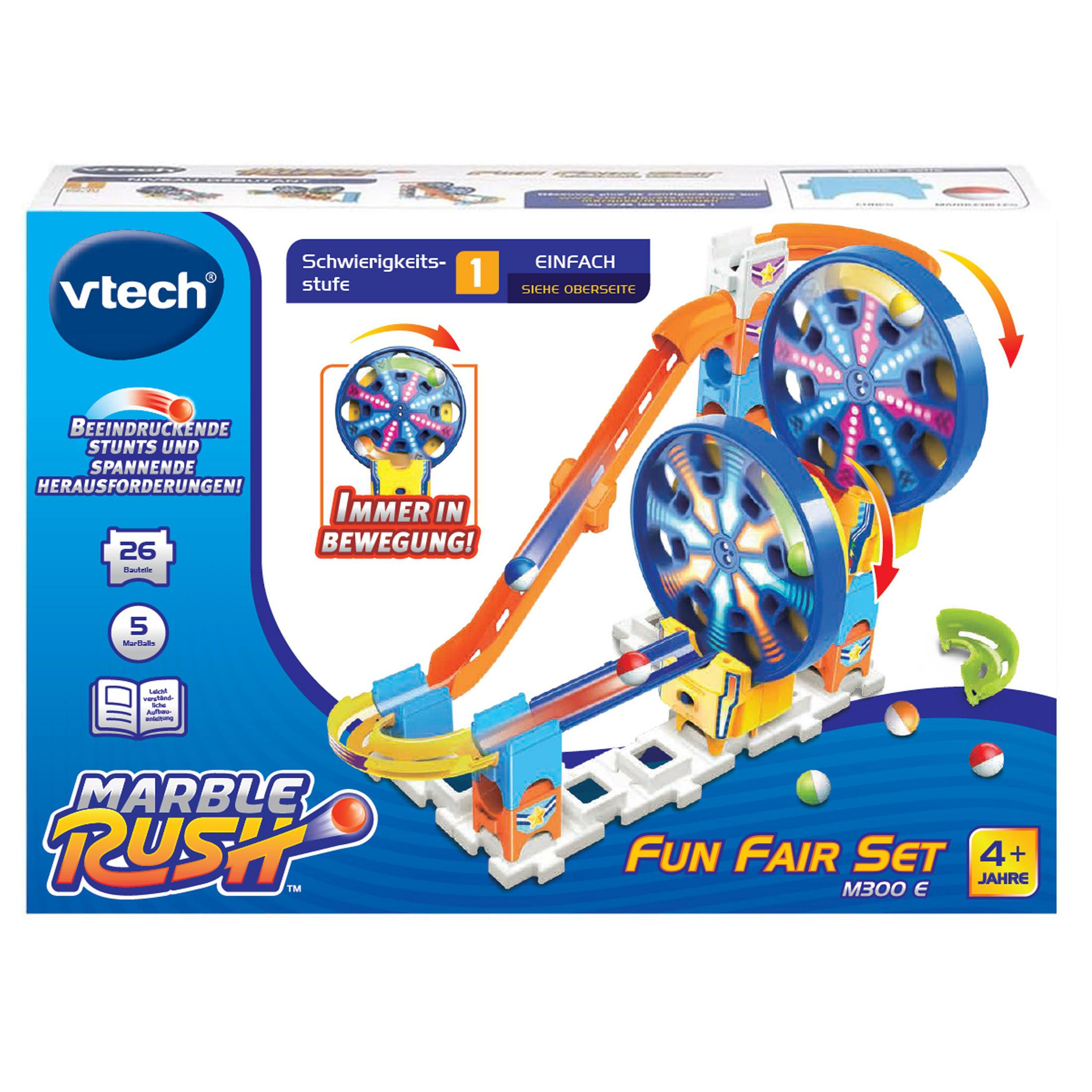 Ein Spielzeugset mit Murmelbahn, Rampen und sich drehenden Rädern. Es ist in einer Box.