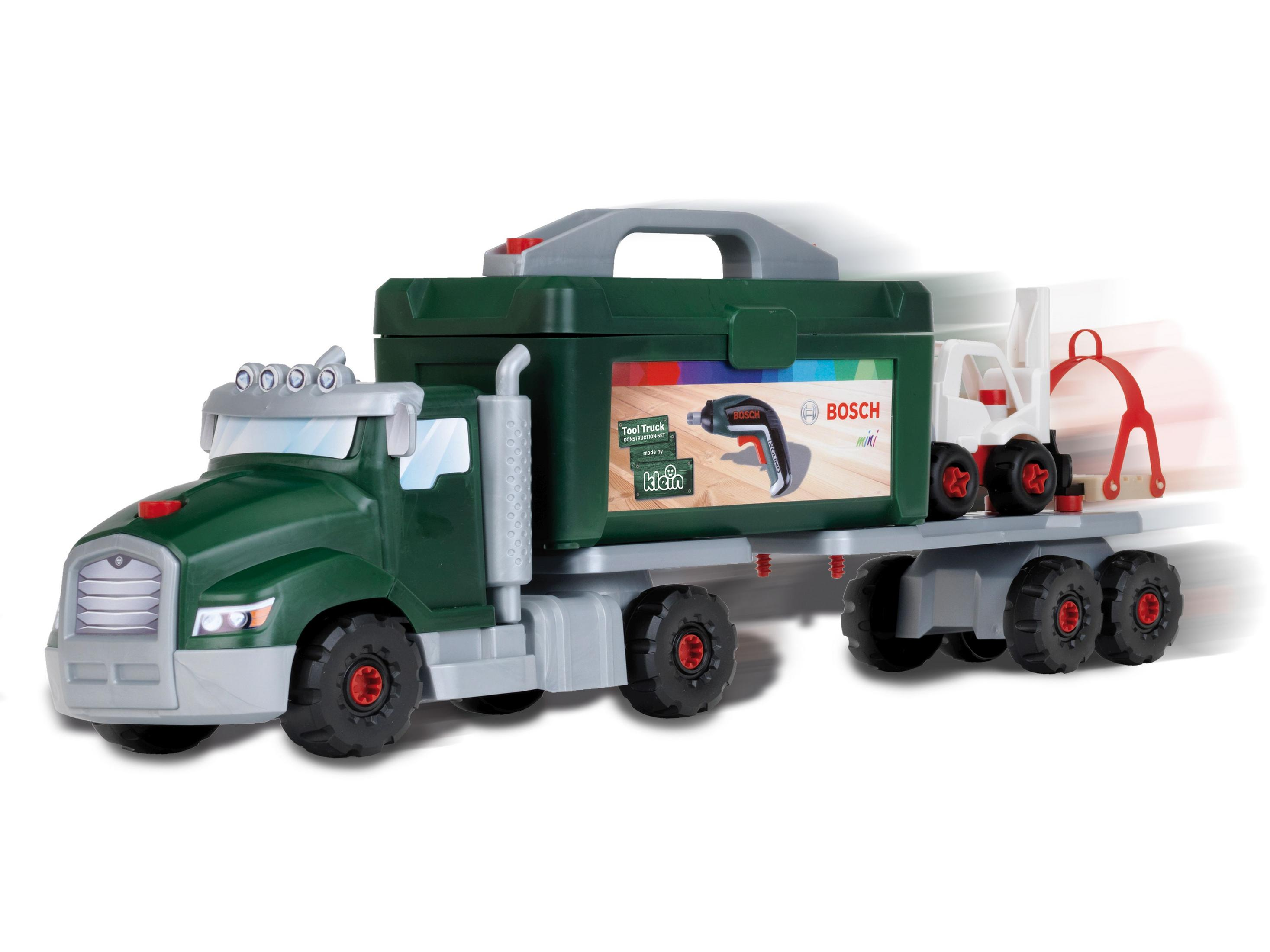 Ein grüner Spielzeug-LKW mit einer schwarzen Werkzeugkiste hinten. Der LKW ist für Kinder.