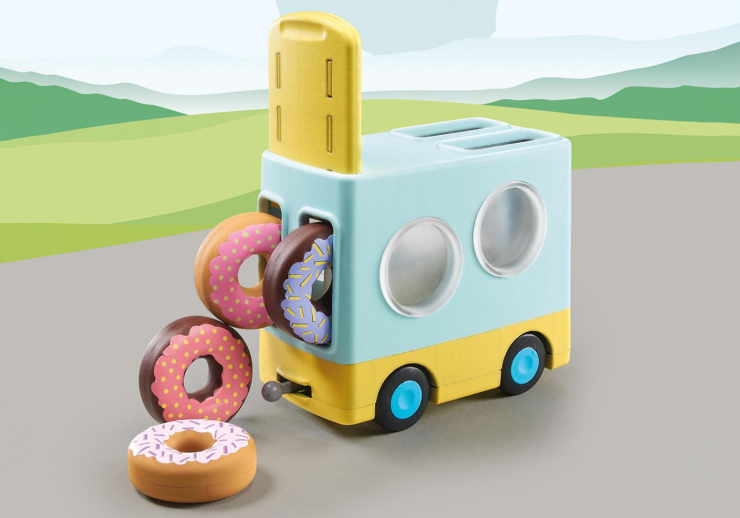 Ein blau-gelber Spielzeug-Eiswagen mit Donuts, die aus der Seite kommen.