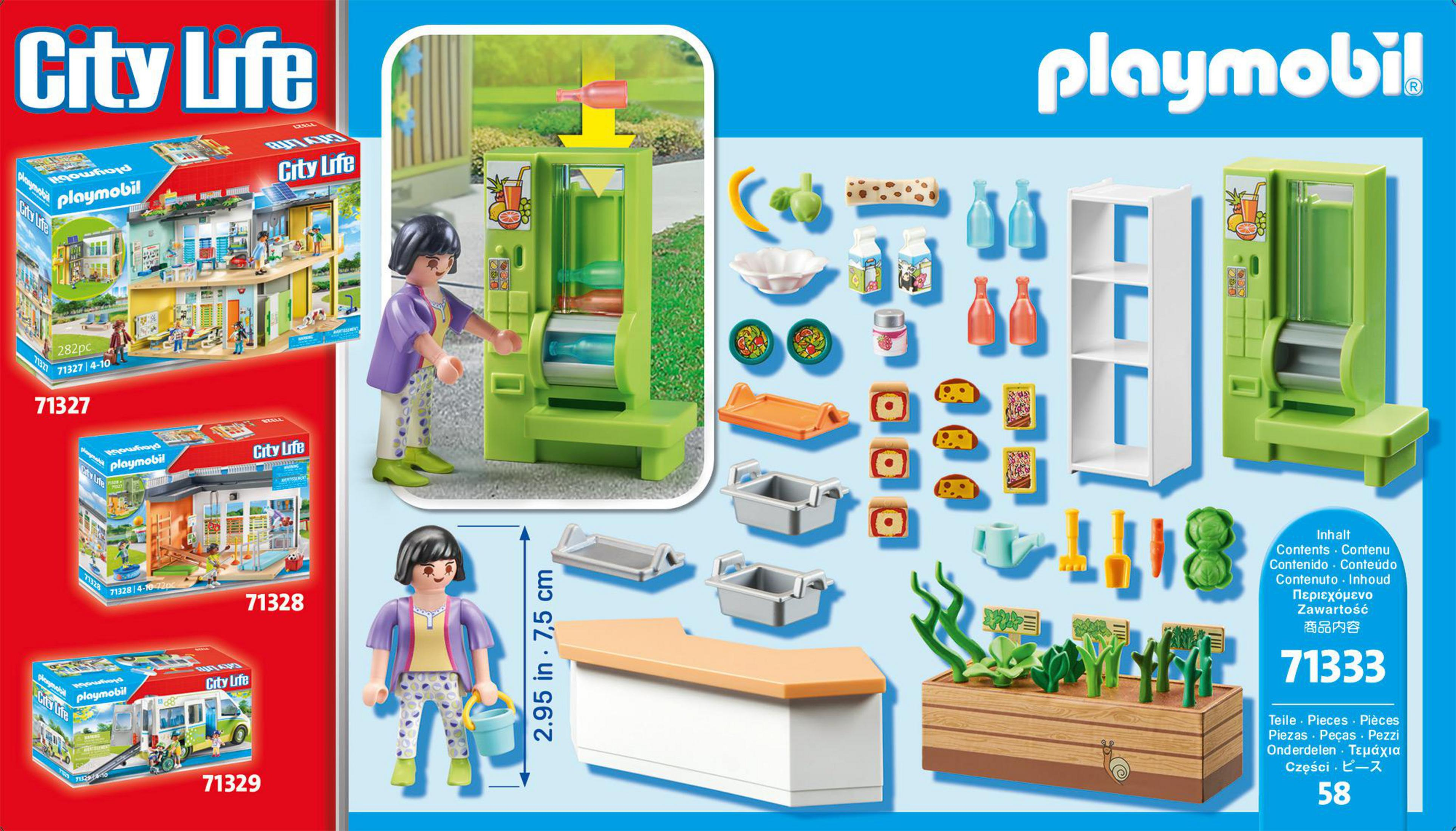 Playmobil City Life Set mit Figuren, Saftbar und Zubehör. Kartons im Hintergrund.