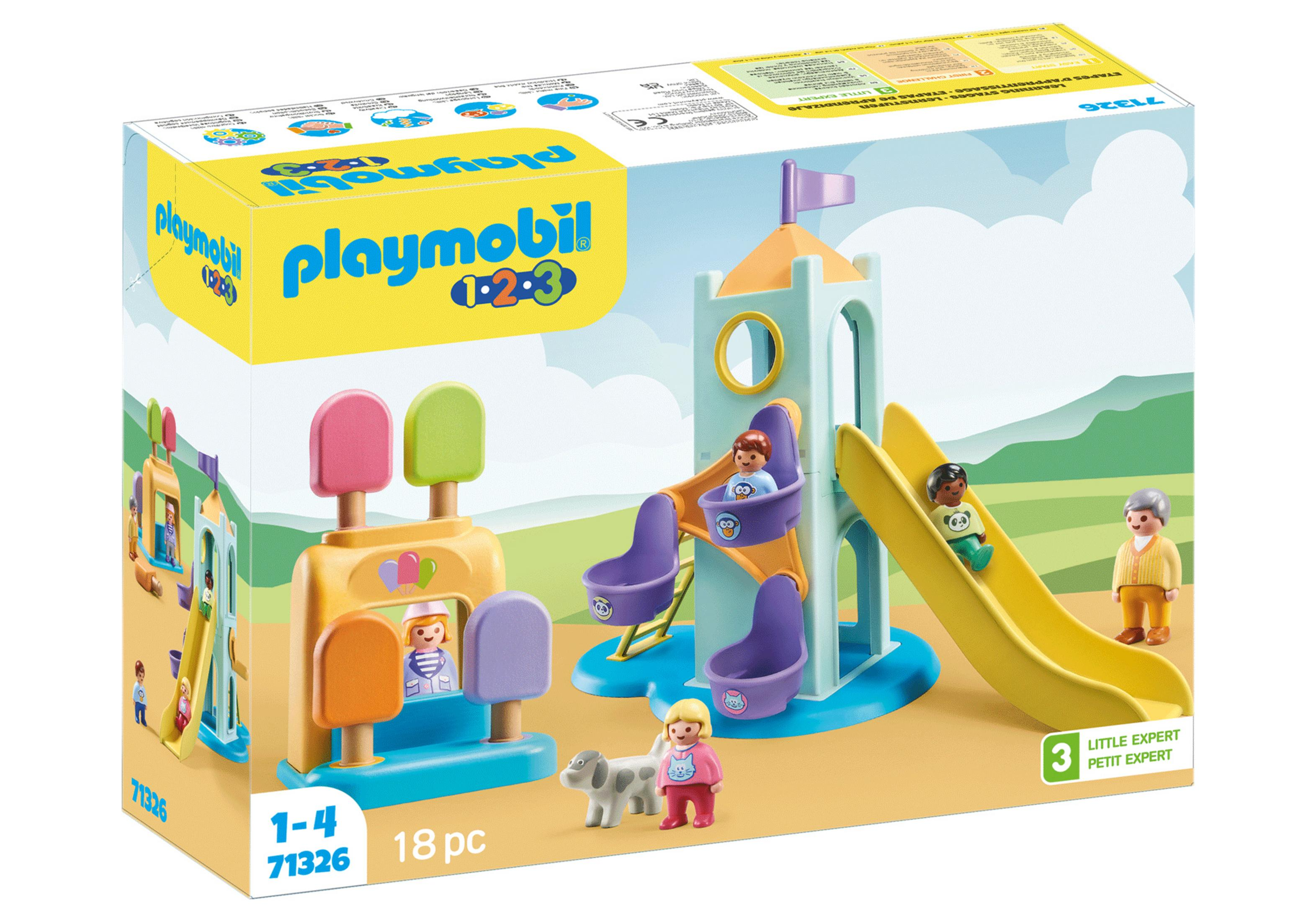 Scatola Playmobil con un parco giochi. Include scivolo, torre e personaggi.