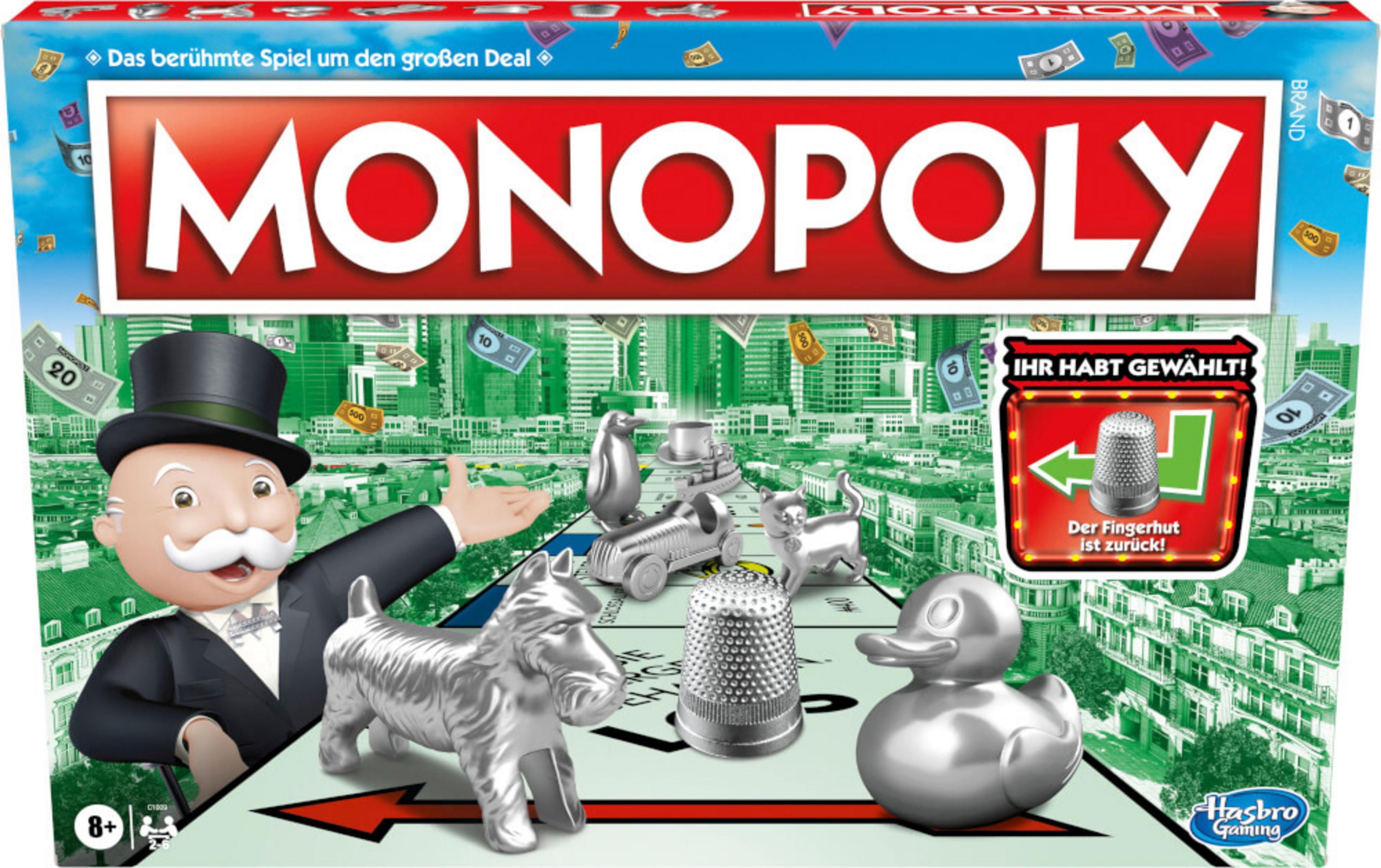 Pudełko gry Monopoly. Plansza z pionkami. Mężczyzna w cylindrze.