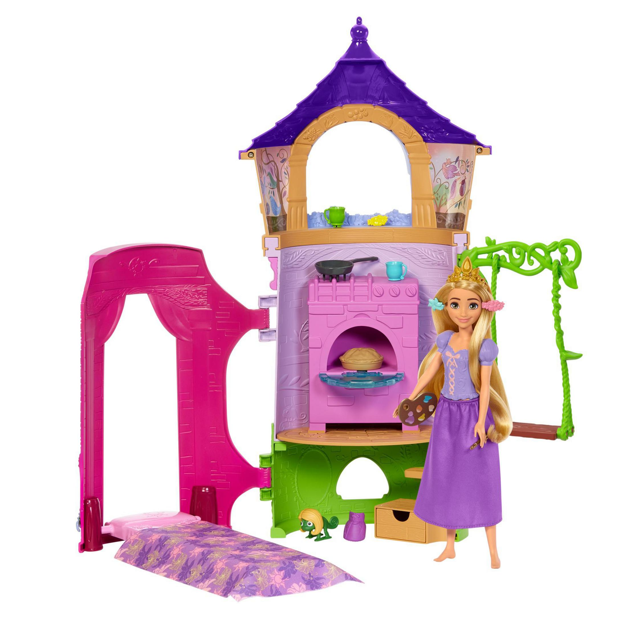 Eine Rapunzel-Puppe mit einem Spielschloss, rosa und lila, auf weißem Hintergrund. Zubehör ist sichtbar.