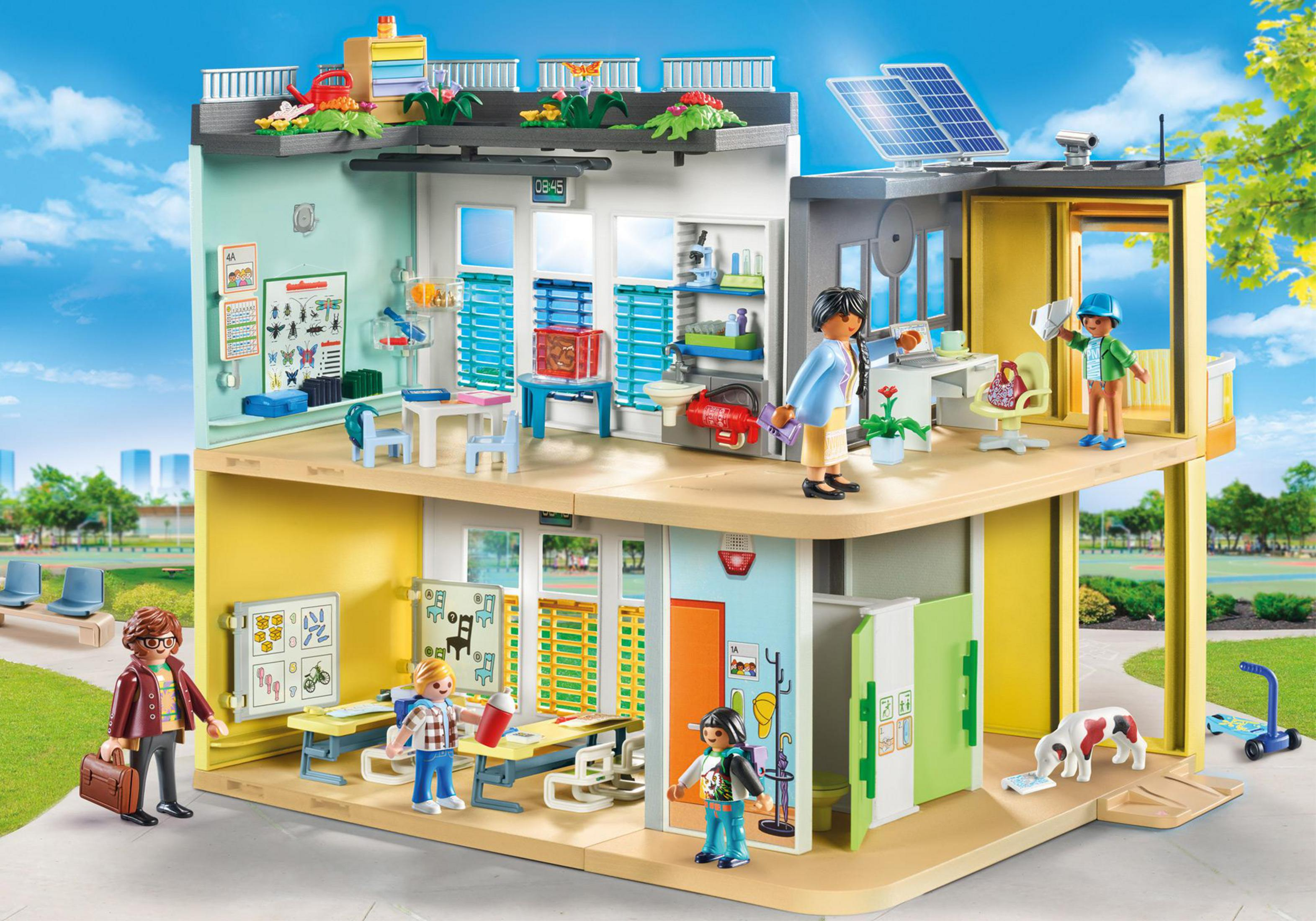 Zestaw Playmobil z kliniką weterynaryjną. Wiele pomieszczeń, figurki, zwierzęta, ogród na dachu.