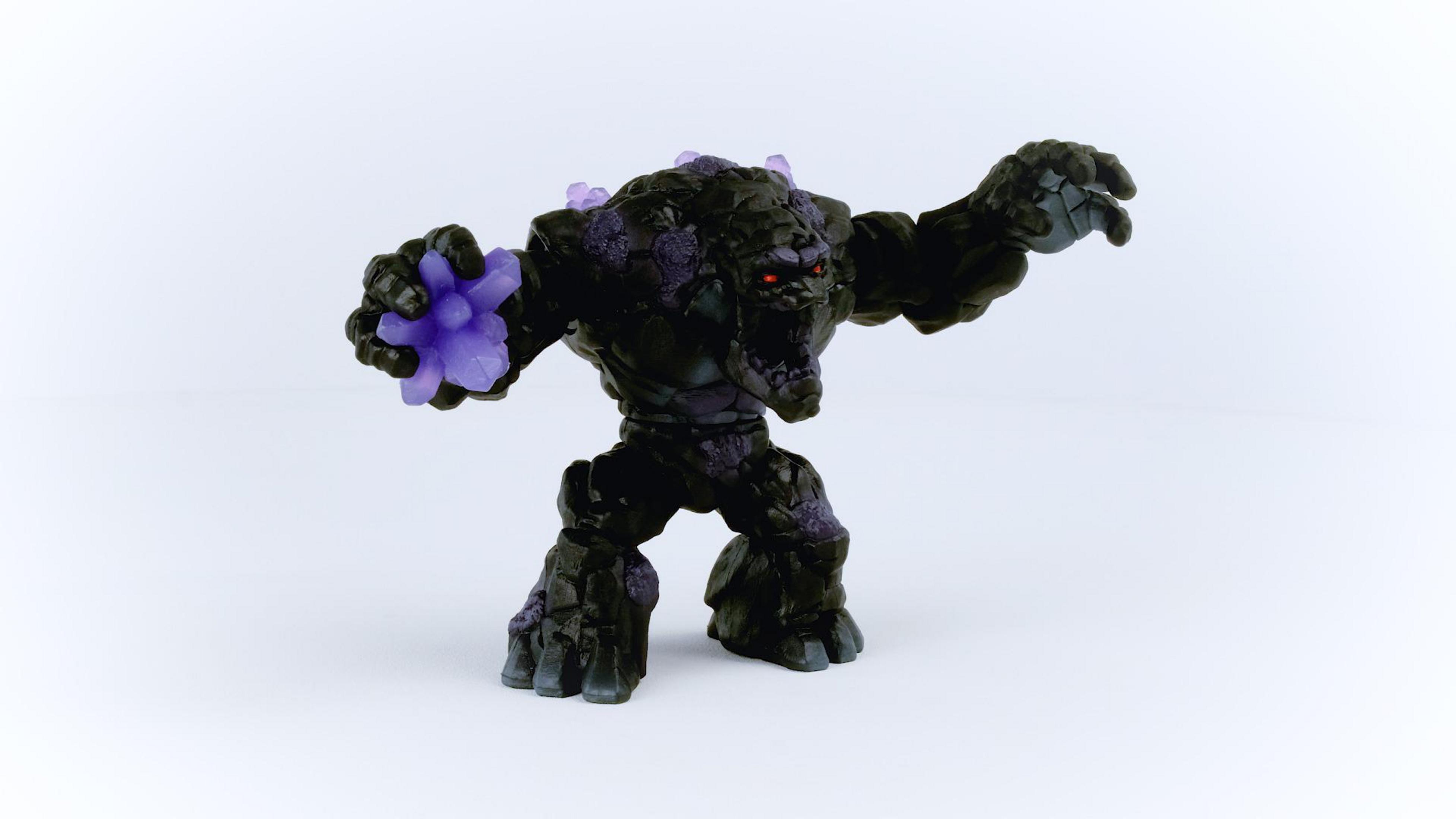 Czarna figurka potwora z fioletowymi akcentami i czerwonymi oczami na białym tle.