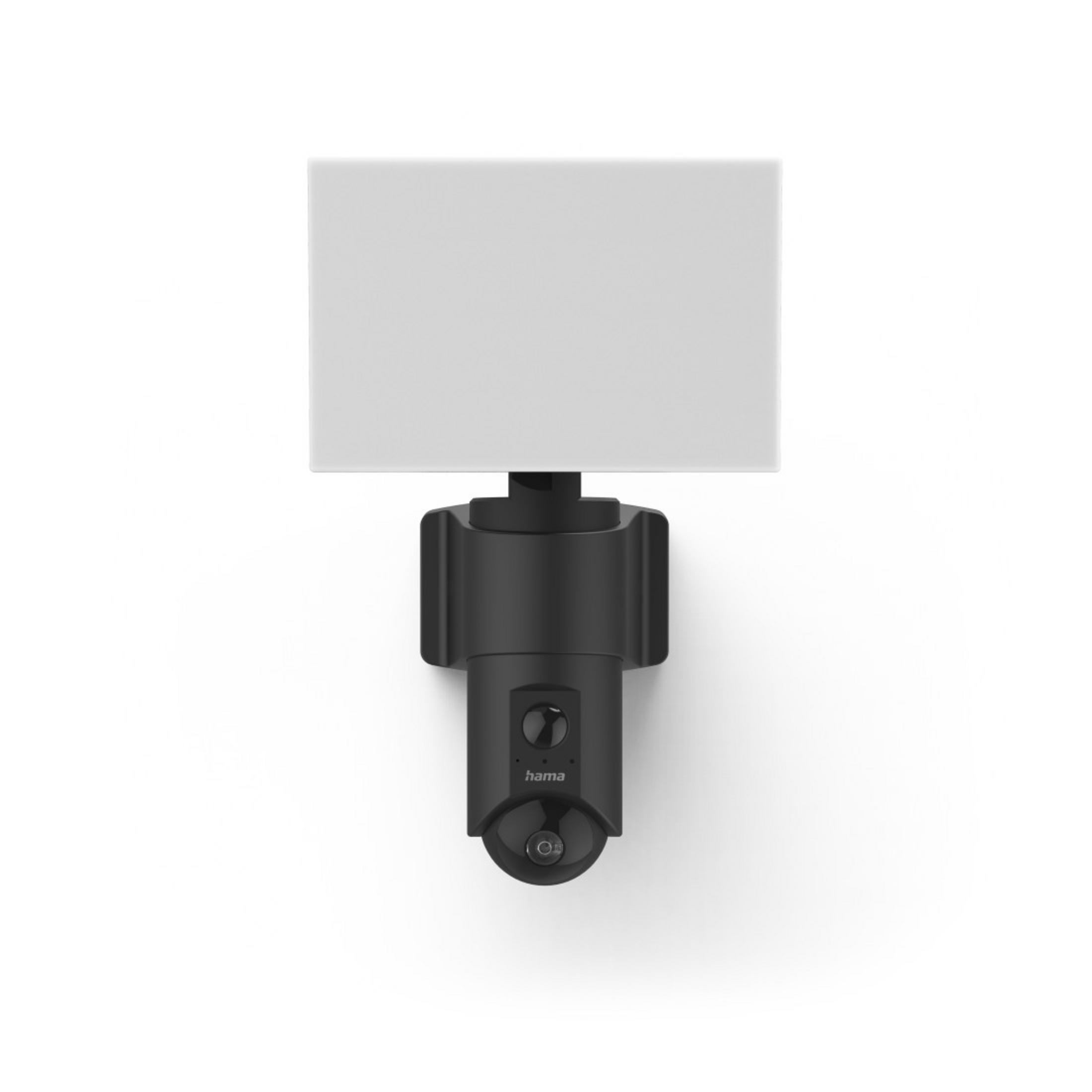 Telecamera di sicurezza esterna nera montata su un muro bianco.
