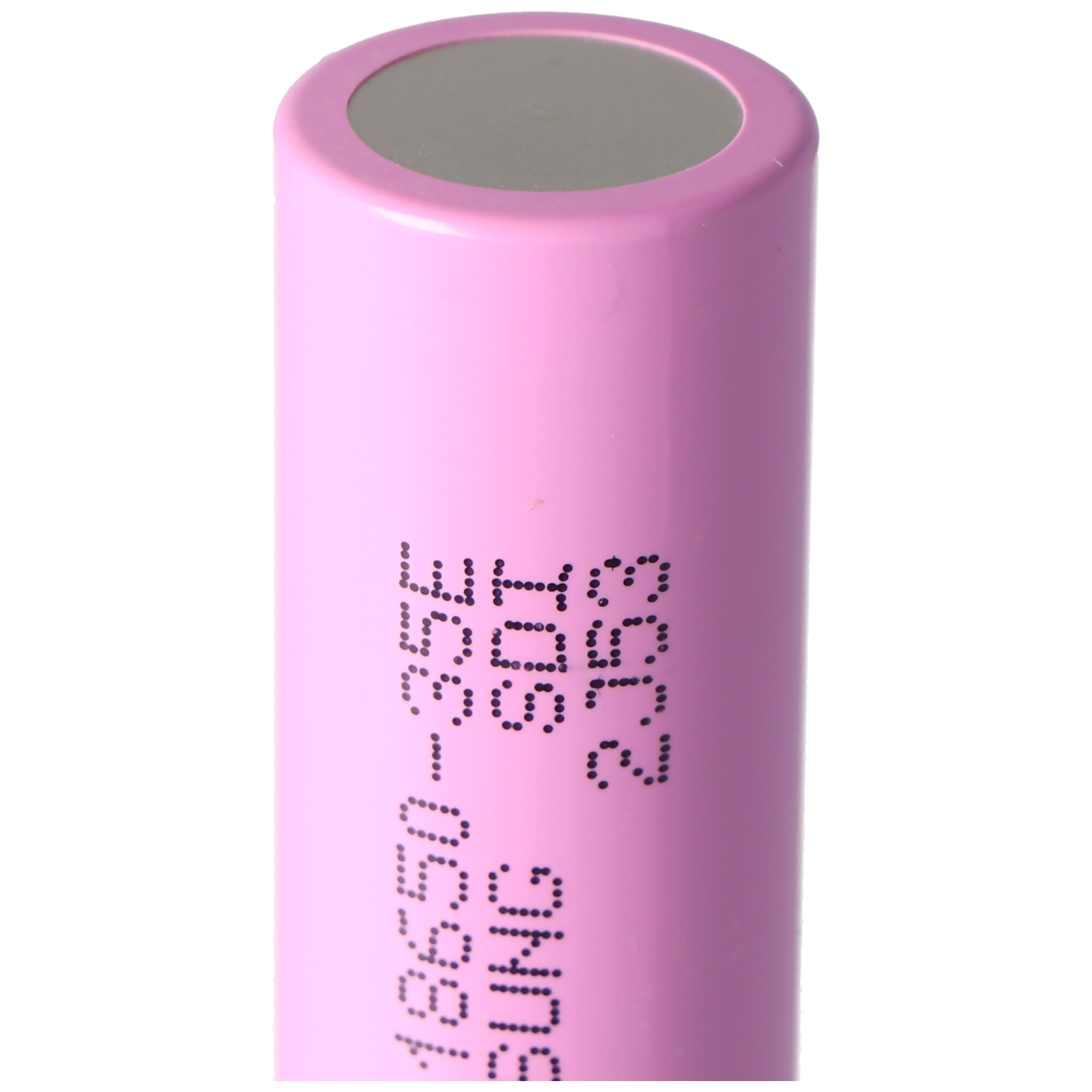 A pink 18650 battery with printed text, close-up view.