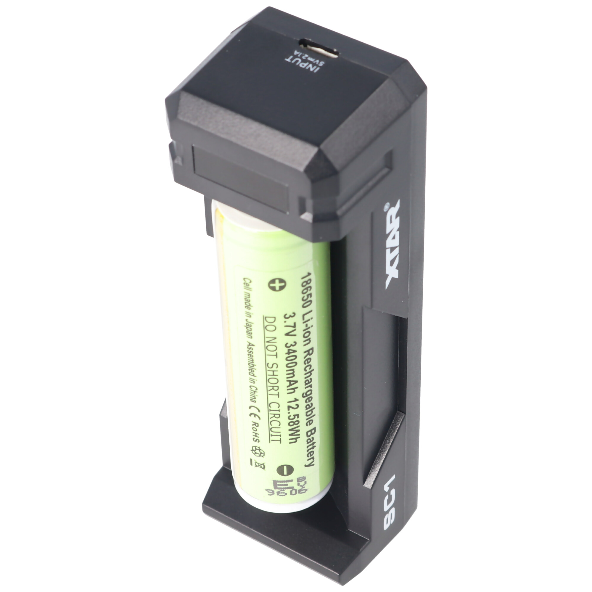 Black battery charger with a green battery. Label on the battery, white background.