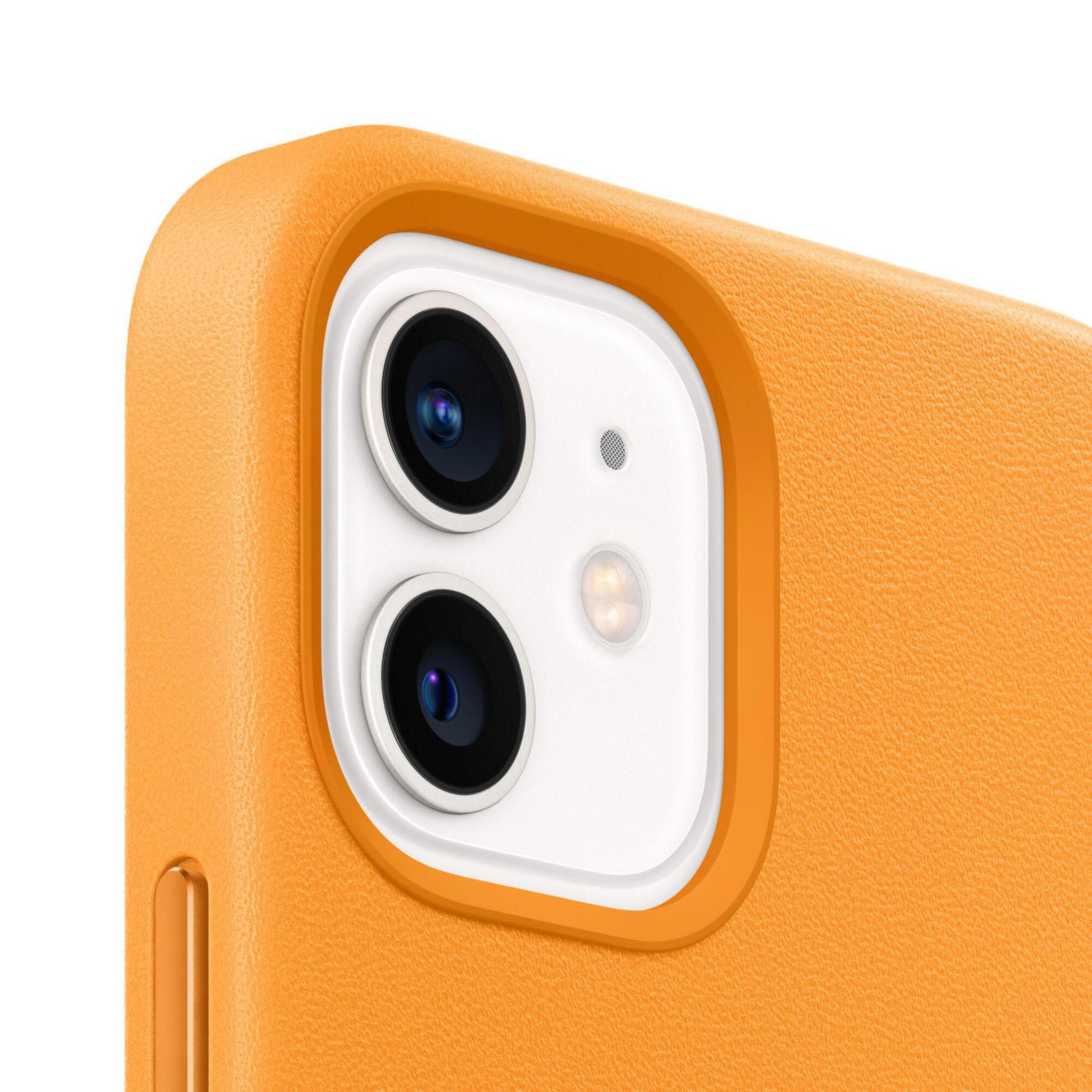 Close-up of a phone camera with a round orange case.