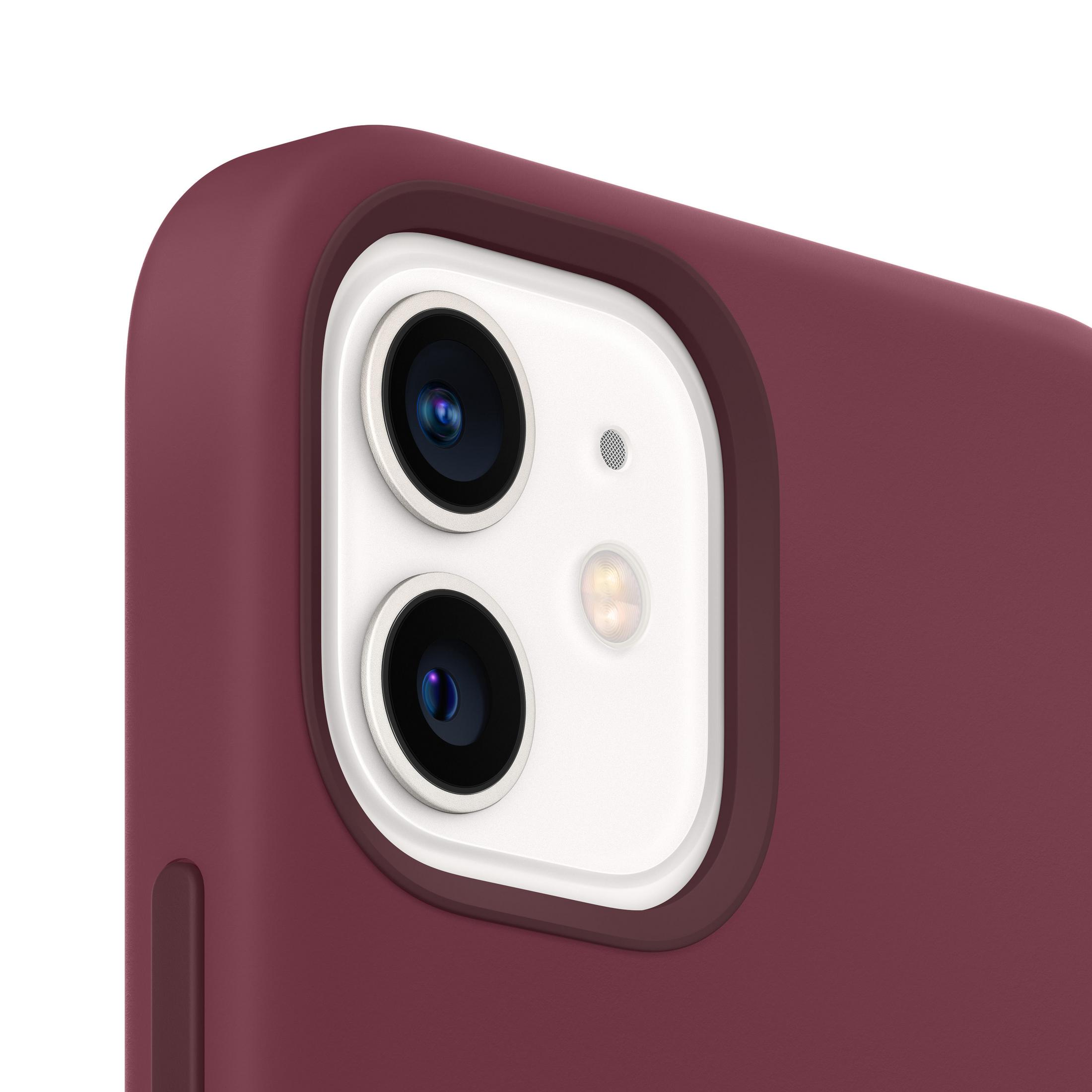 Zbliżenie modułu aparatu iPhone 12 Pro w kolorze bordowym z dwoma obiektywami i lampą.