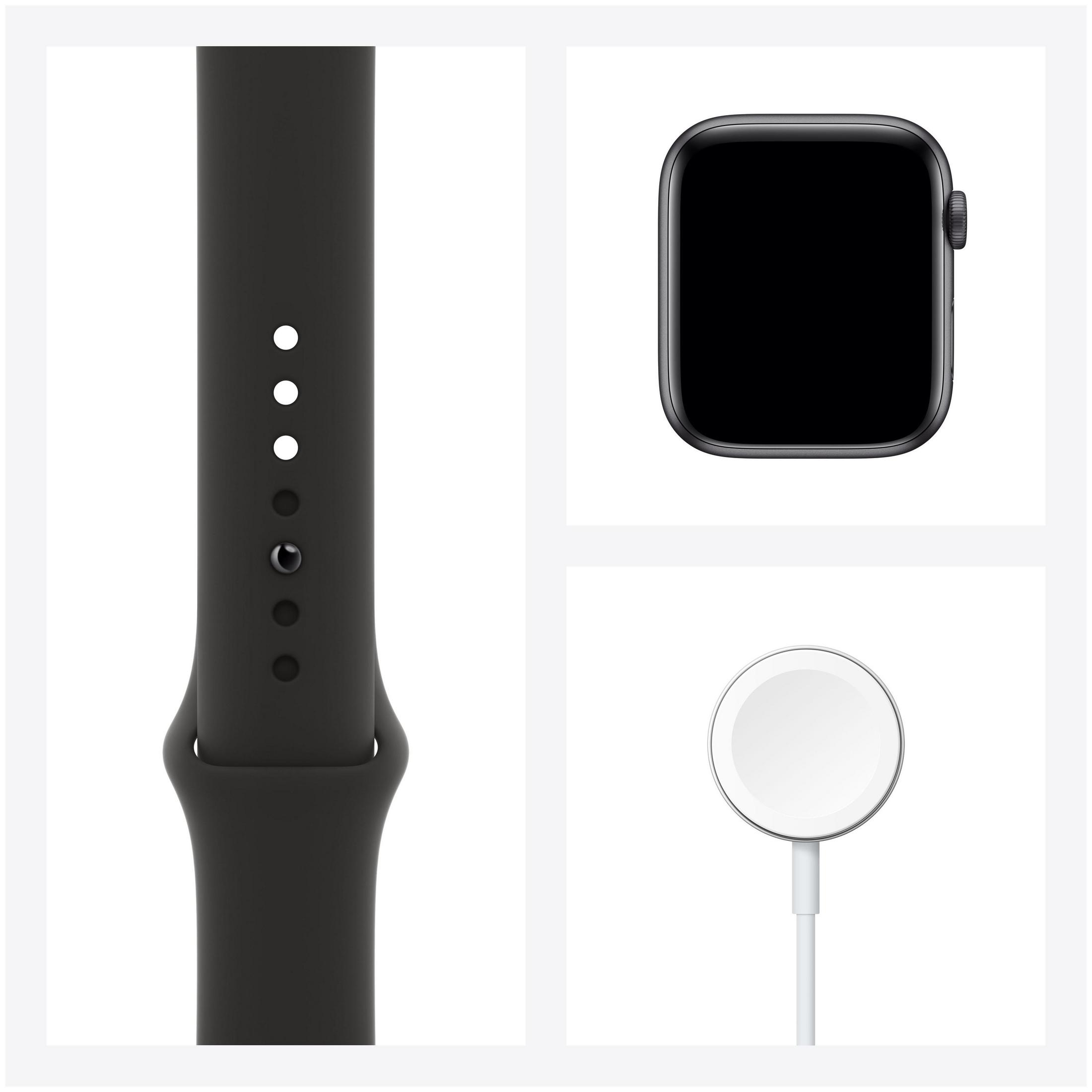 Schwarze Apple Watch-Teile: Armband mit Löchern, Zifferblatt und Ladescheibe mit Kabel.