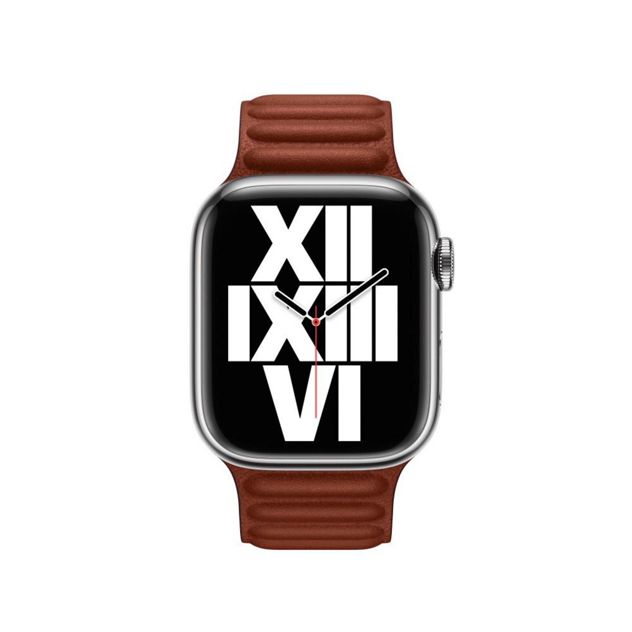 Apple Watch con cinturino in pelle marrone che mostra numeri romani sul quadrante.