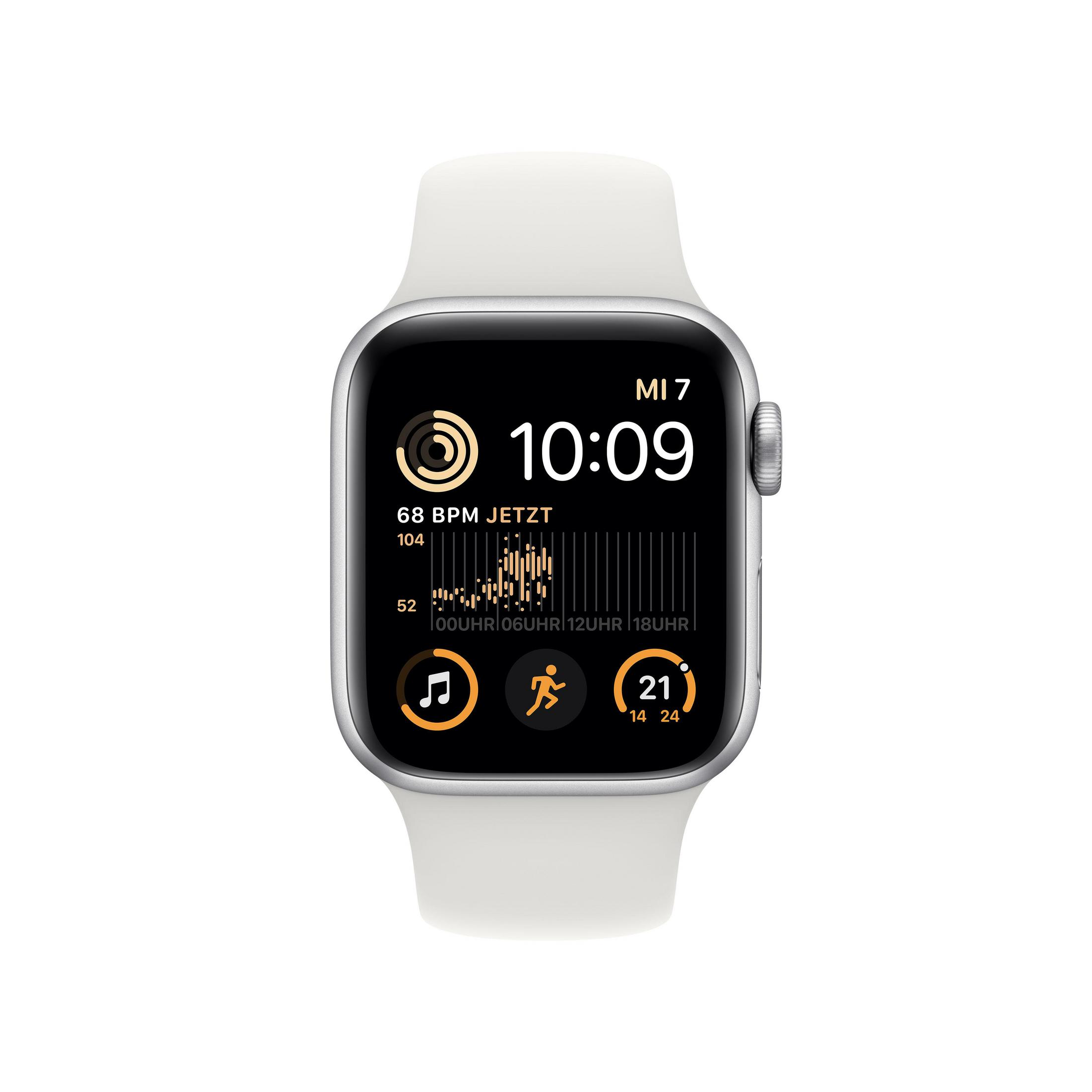 Silberne Apple Watch mit weißem Armband, die Zeit und Gesundheitsdaten anzeigt.