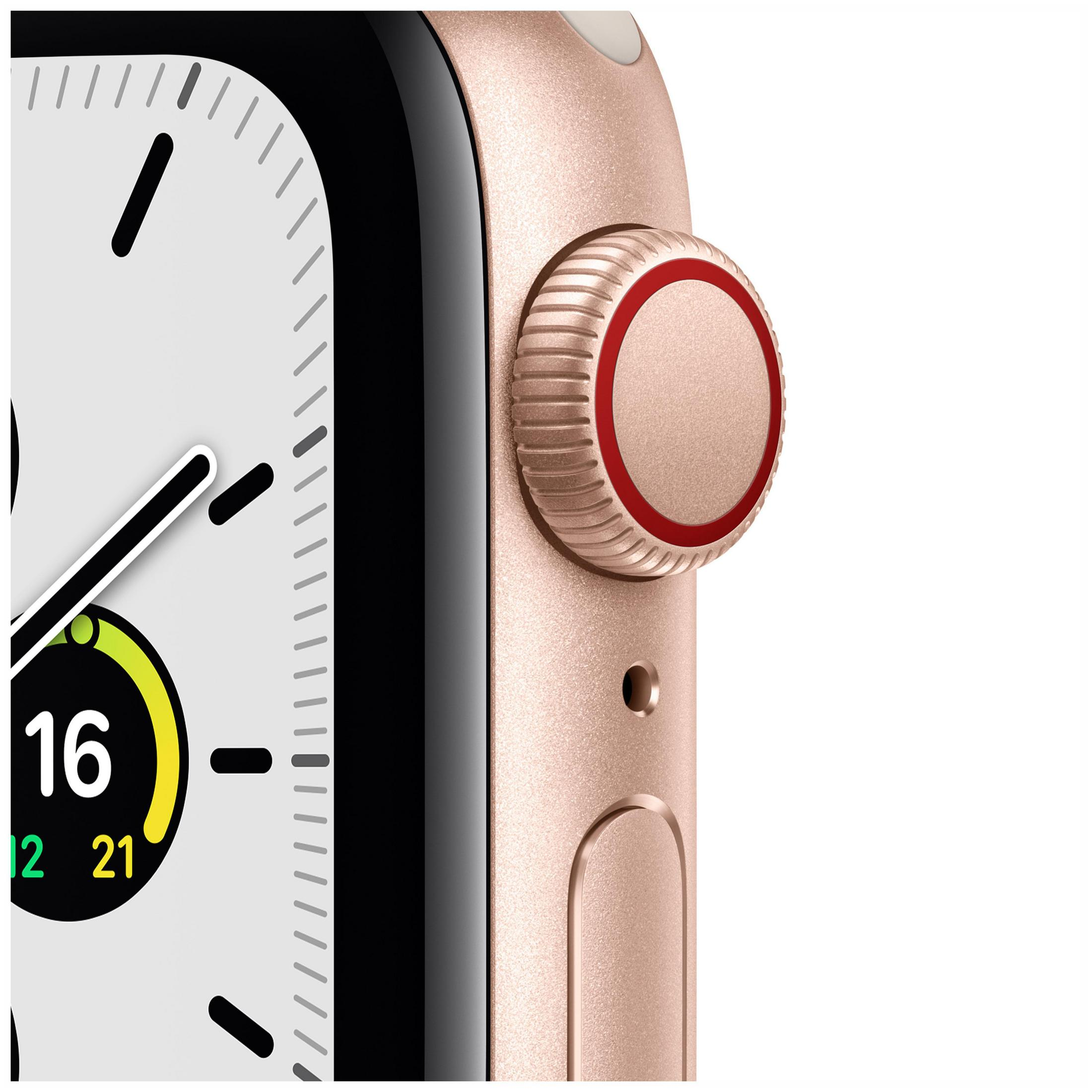 Close-up van de zijkant van een gouden Apple Watch met digitale kroon en knoppen.