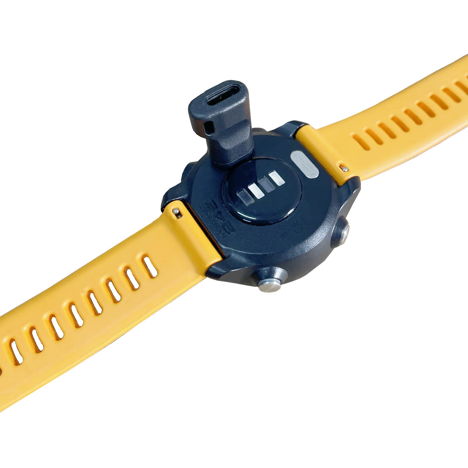 Żółty pasek do zegarka z czarną tarczą i portem ładowania. Widoczny jest tył zegarka.