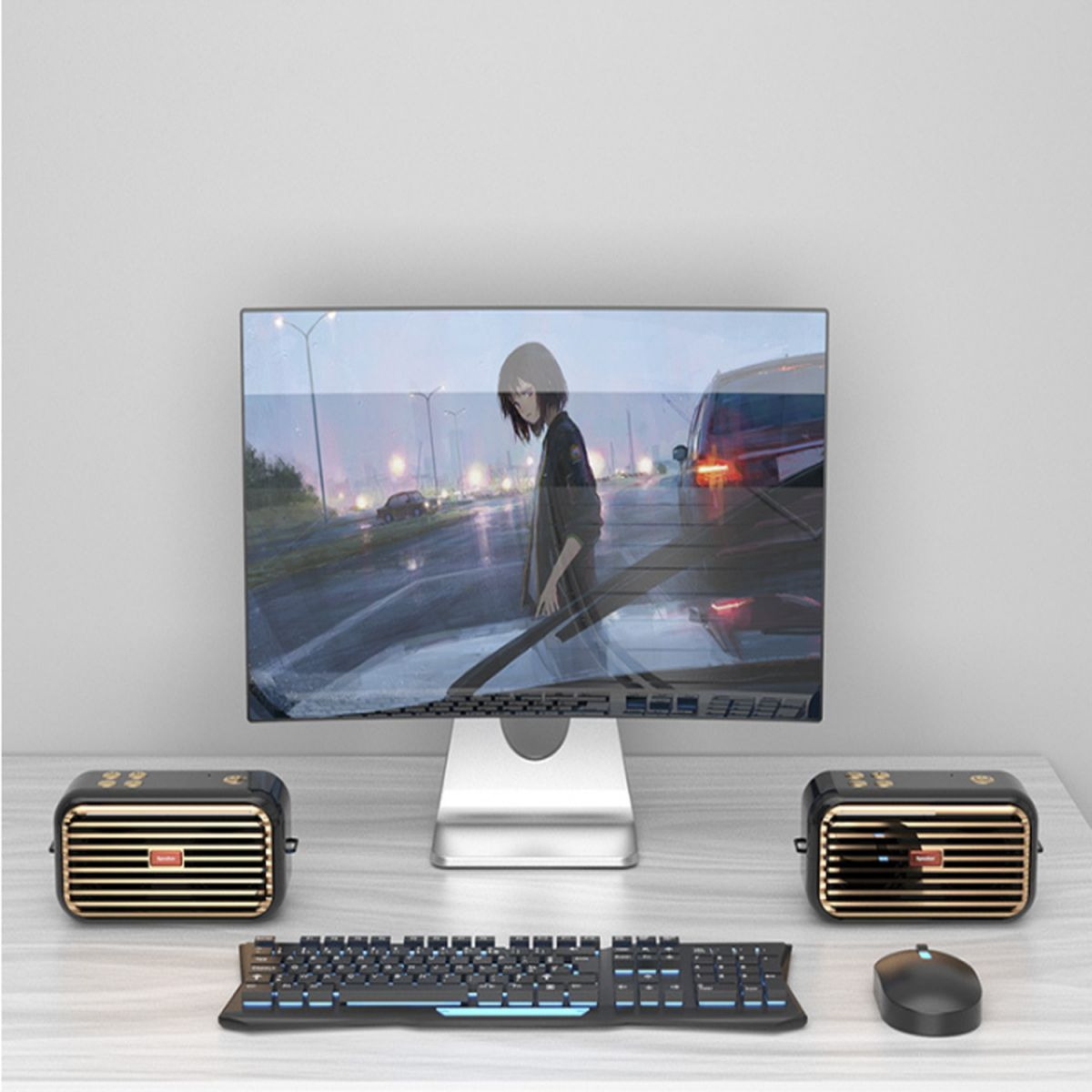 Ein Computer-Setup mit einem Bildschirm, der eine Szene zeigt, Lautsprechern, Tastatur und Maus.