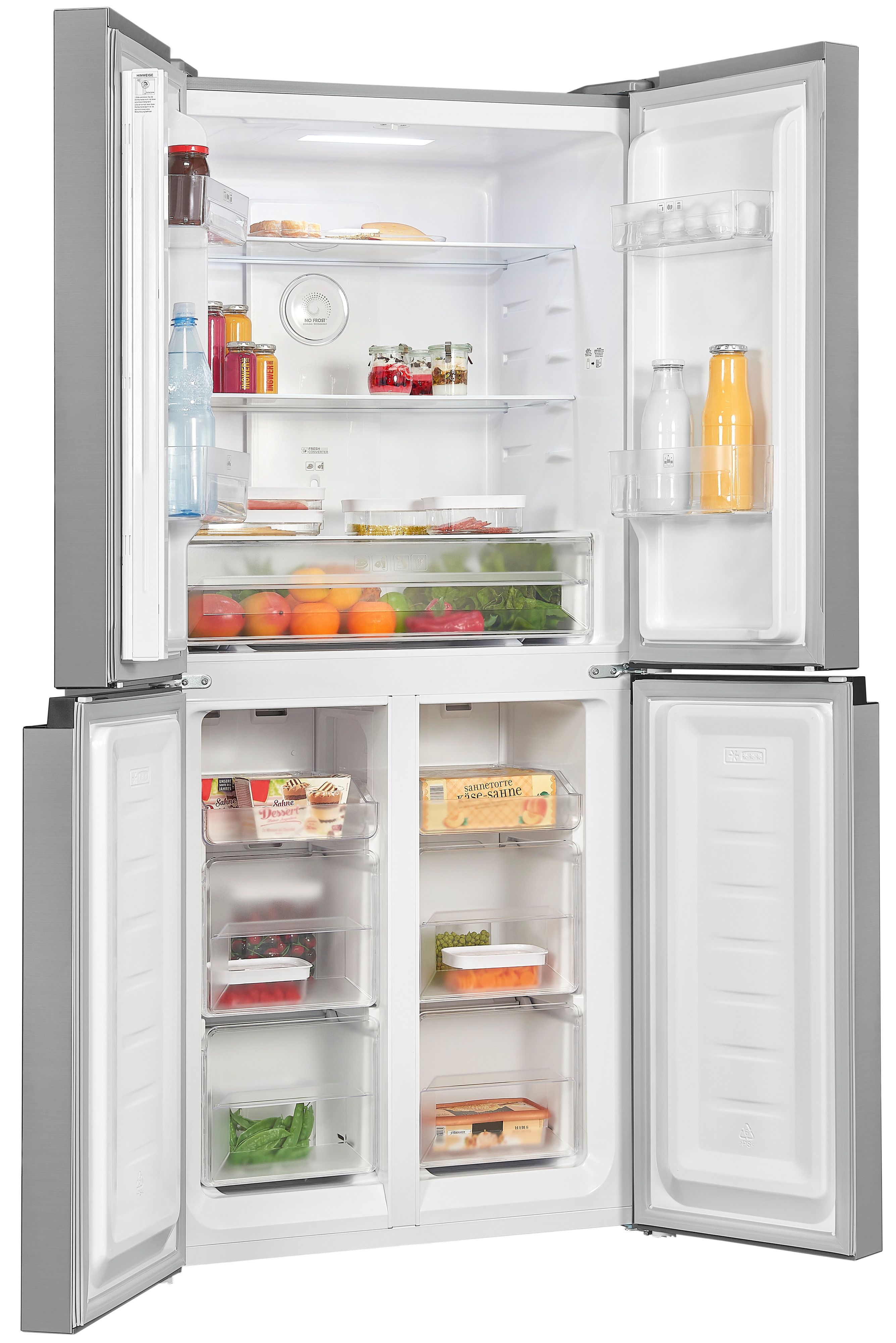 Refrigerador plateado abierto con múltiples compartimentos llenos de alimentos.