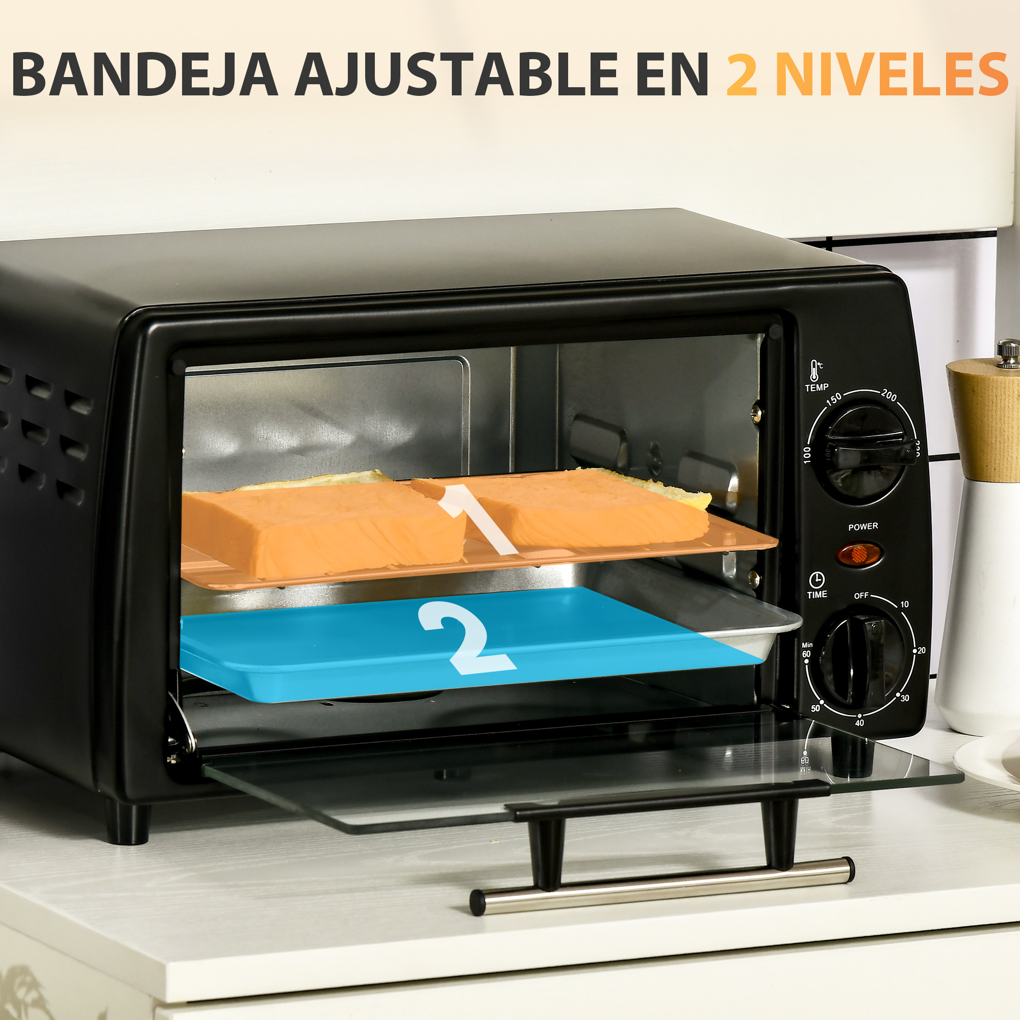 Horno tostador negro con dos niveles, con comida dentro.