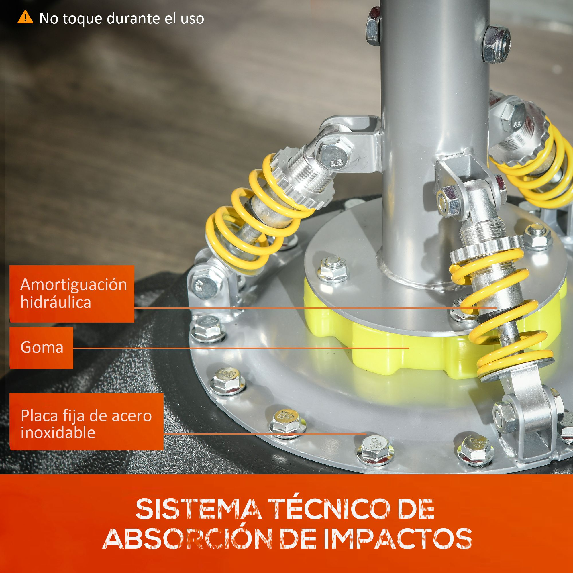Primer plano de una base de máquina plateada con muelles amarillos y una base de goma negra.