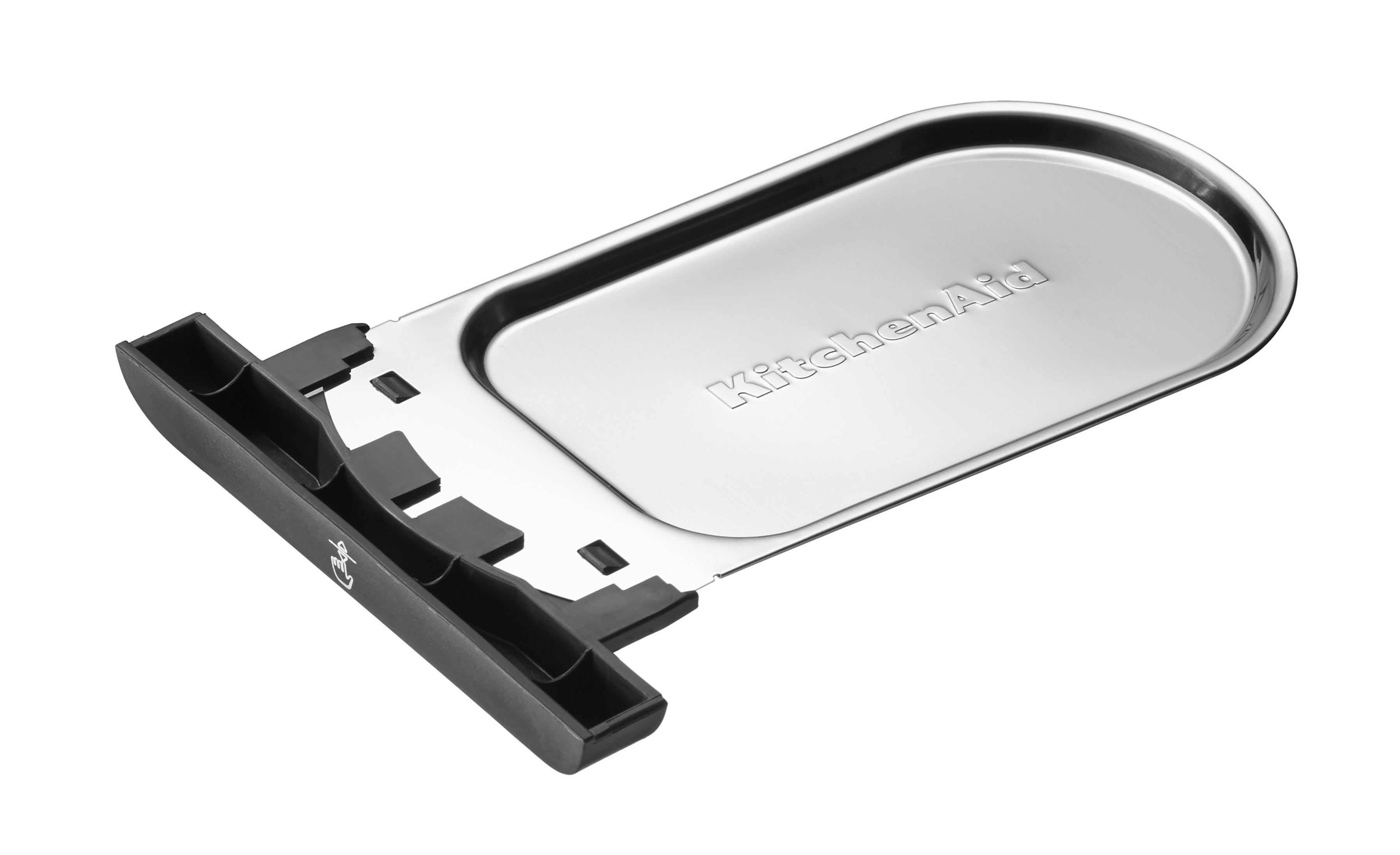 Stainless steel KitchenAid toaster crumb tray. Black plastic handle and supports.