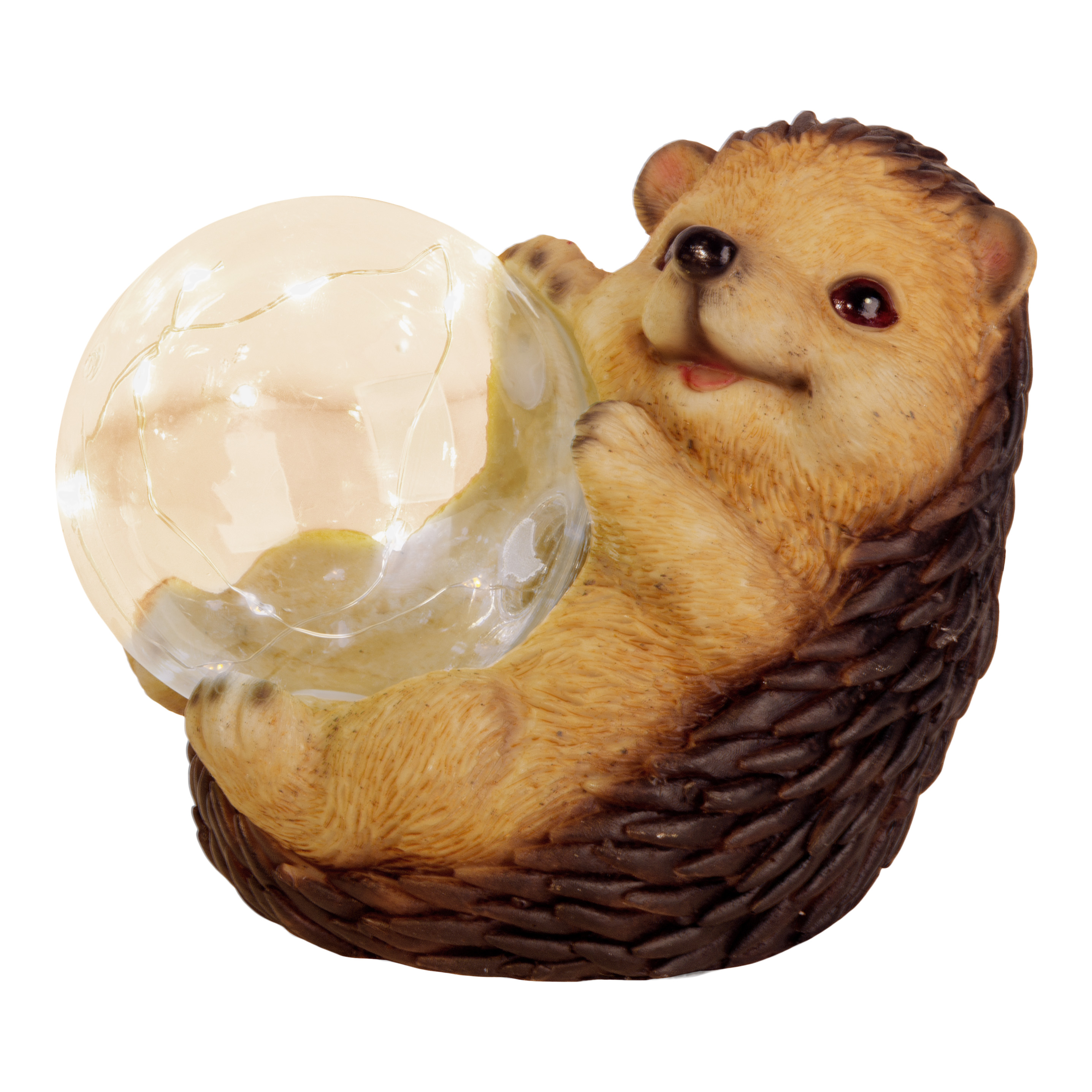 Eine igelförmige Lampe, die einen leuchtenden Ball hält. Sie hat einen braunen und beigen Körper.