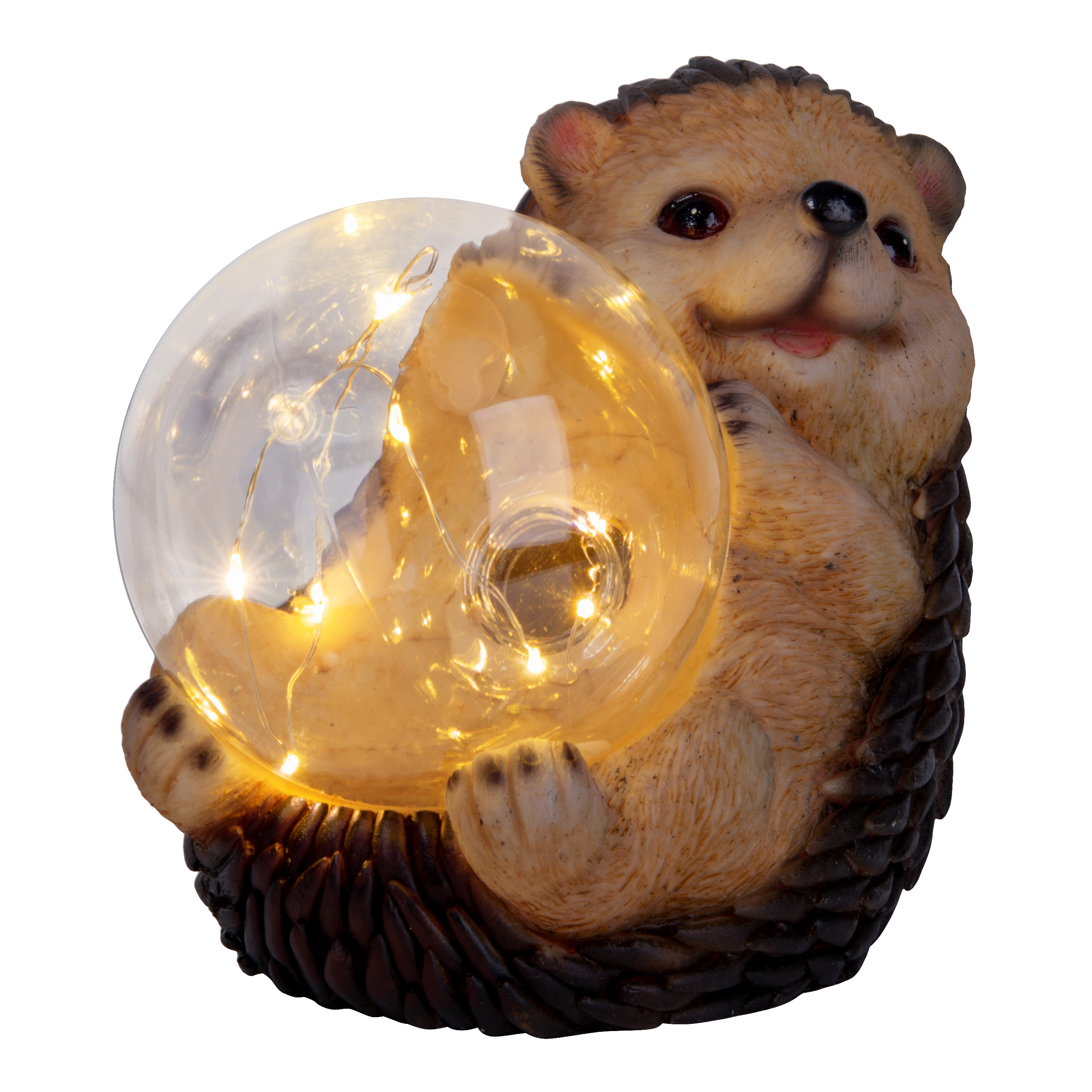 Igel-Figur hält beleuchtete Glaskugel mit Lichtern.